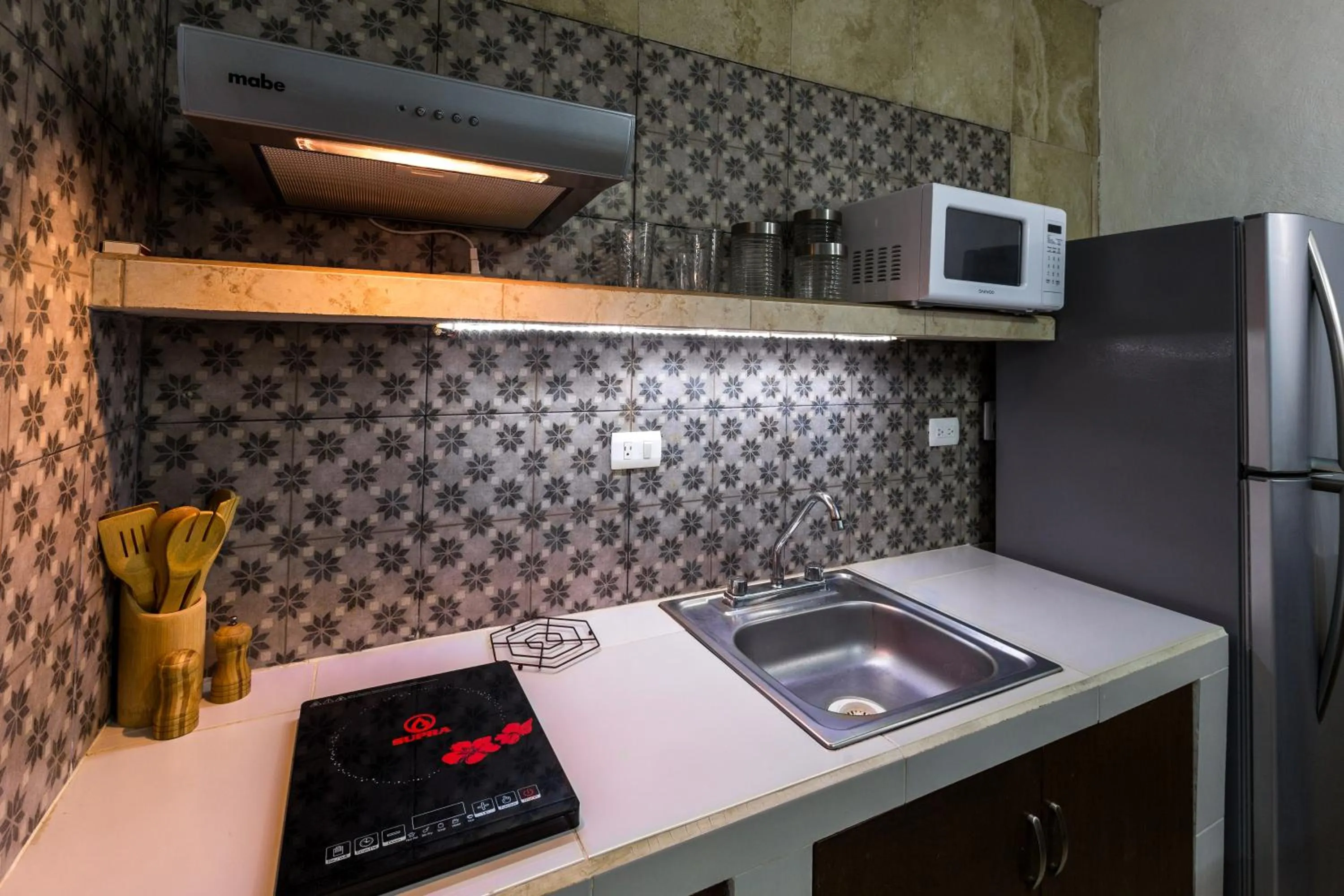 Kitchen or kitchenette in Merida Serviced Apartments