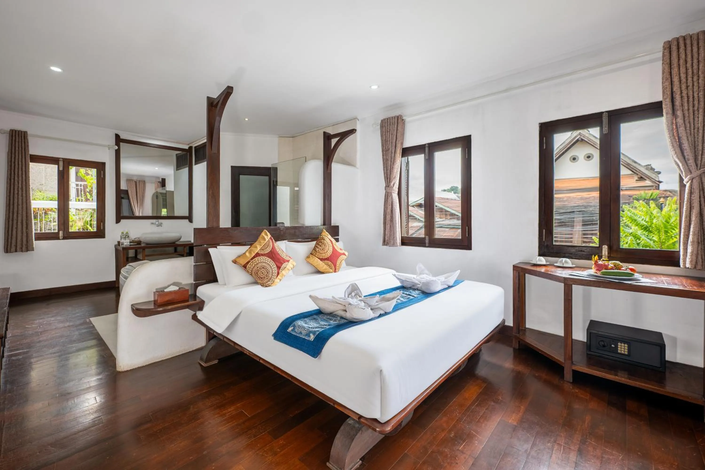 Bed in Ancient Luangprabang Hotel