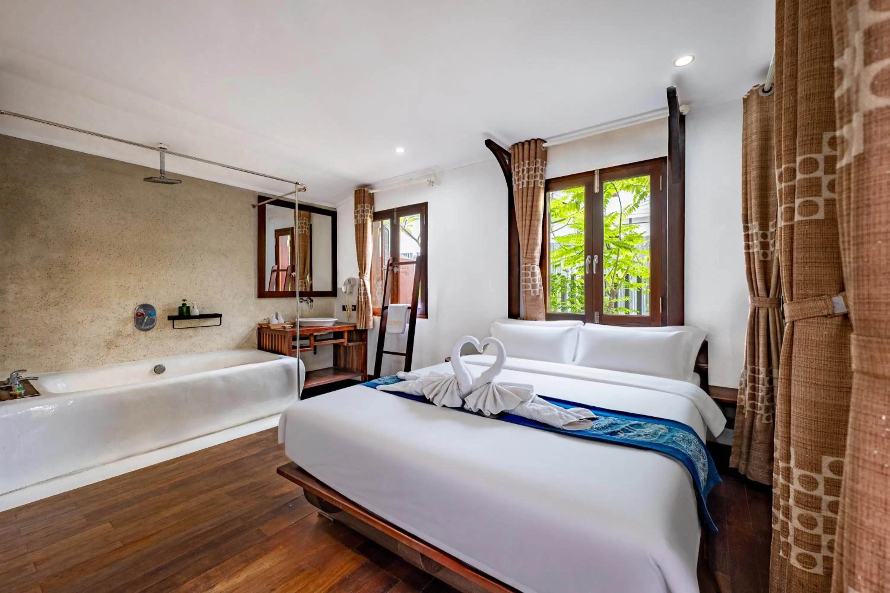 Bed in Ancient Luangprabang Hotel