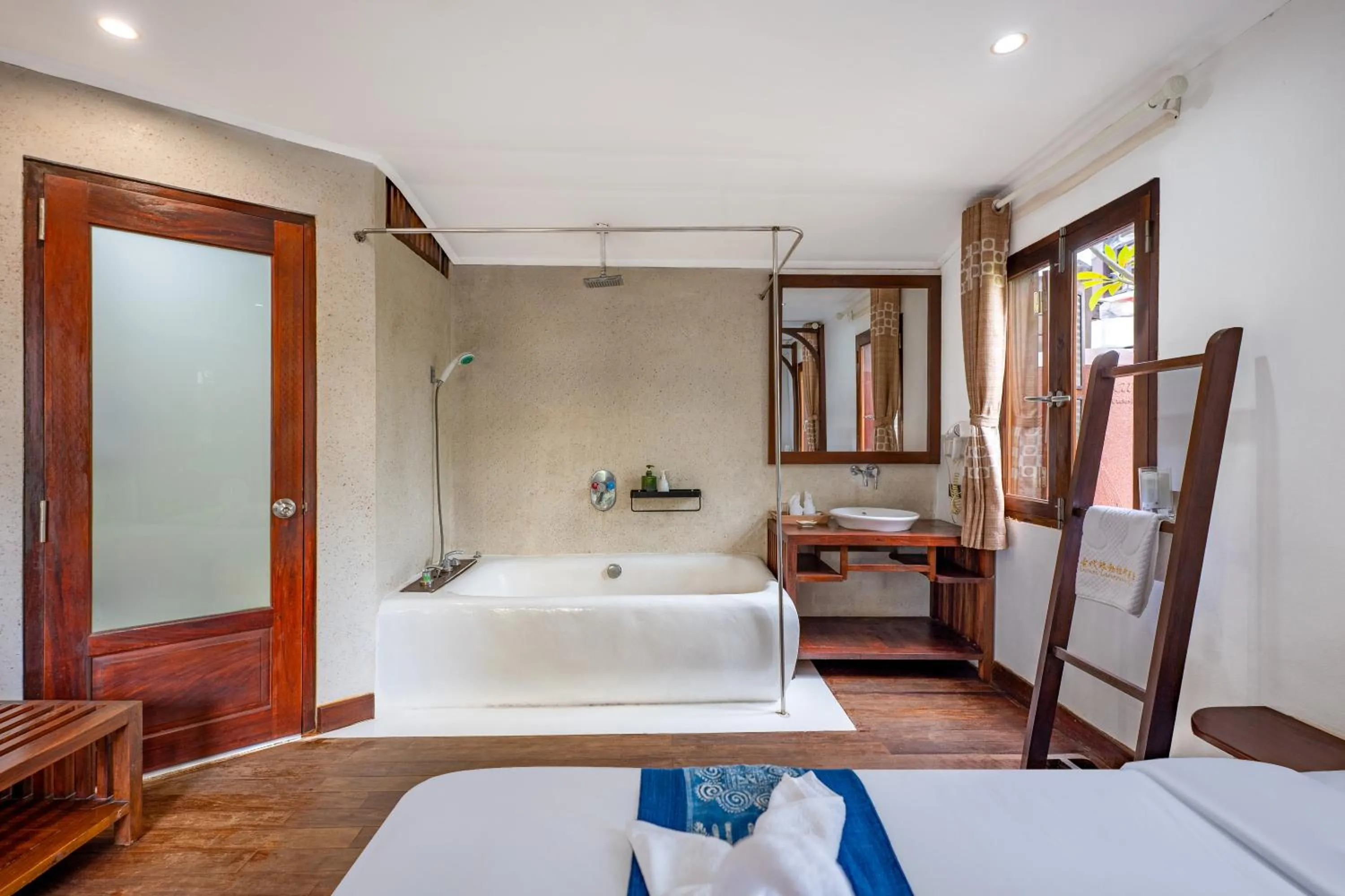 Bed in Ancient Luangprabang Hotel