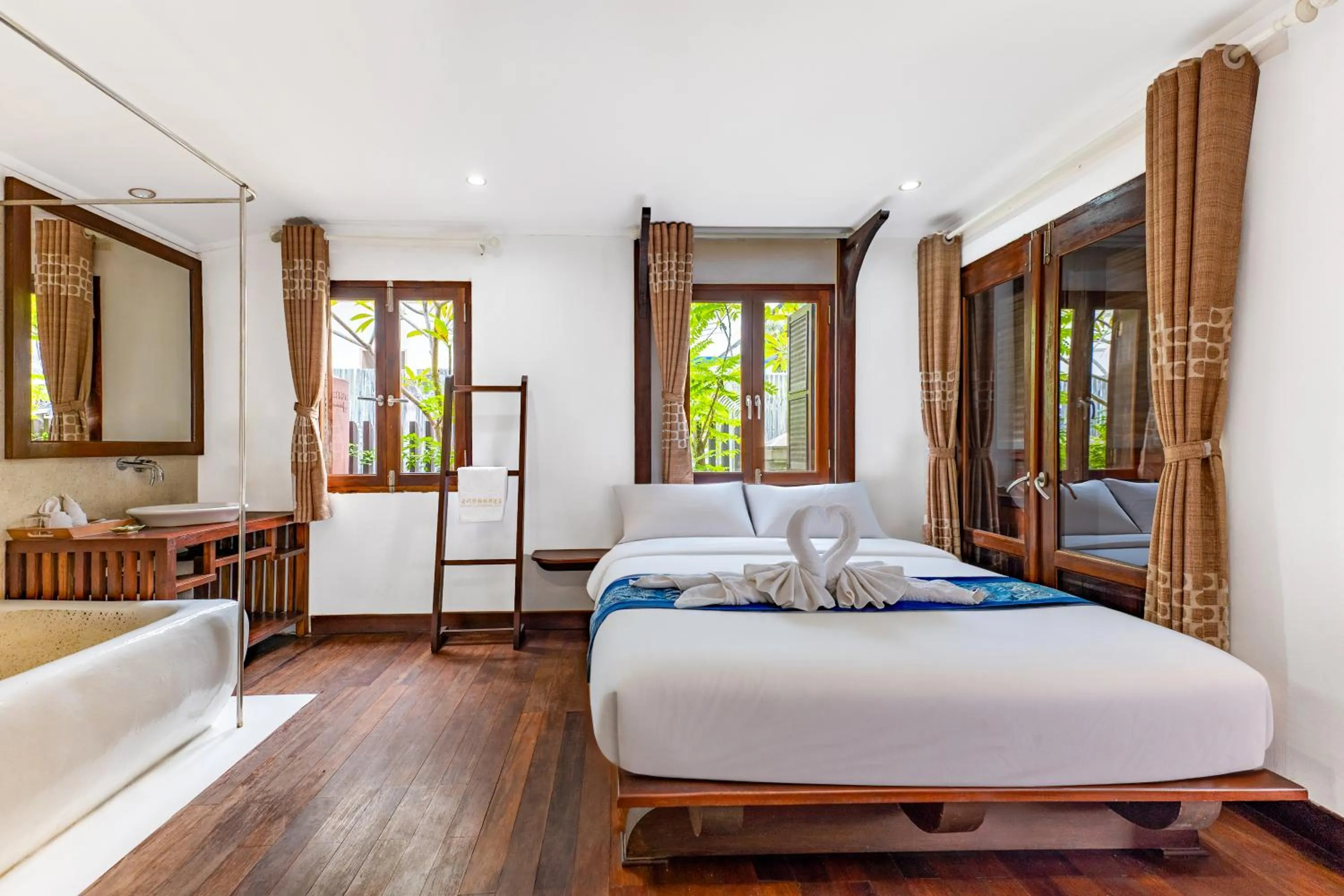 Bed in Ancient Luangprabang Hotel