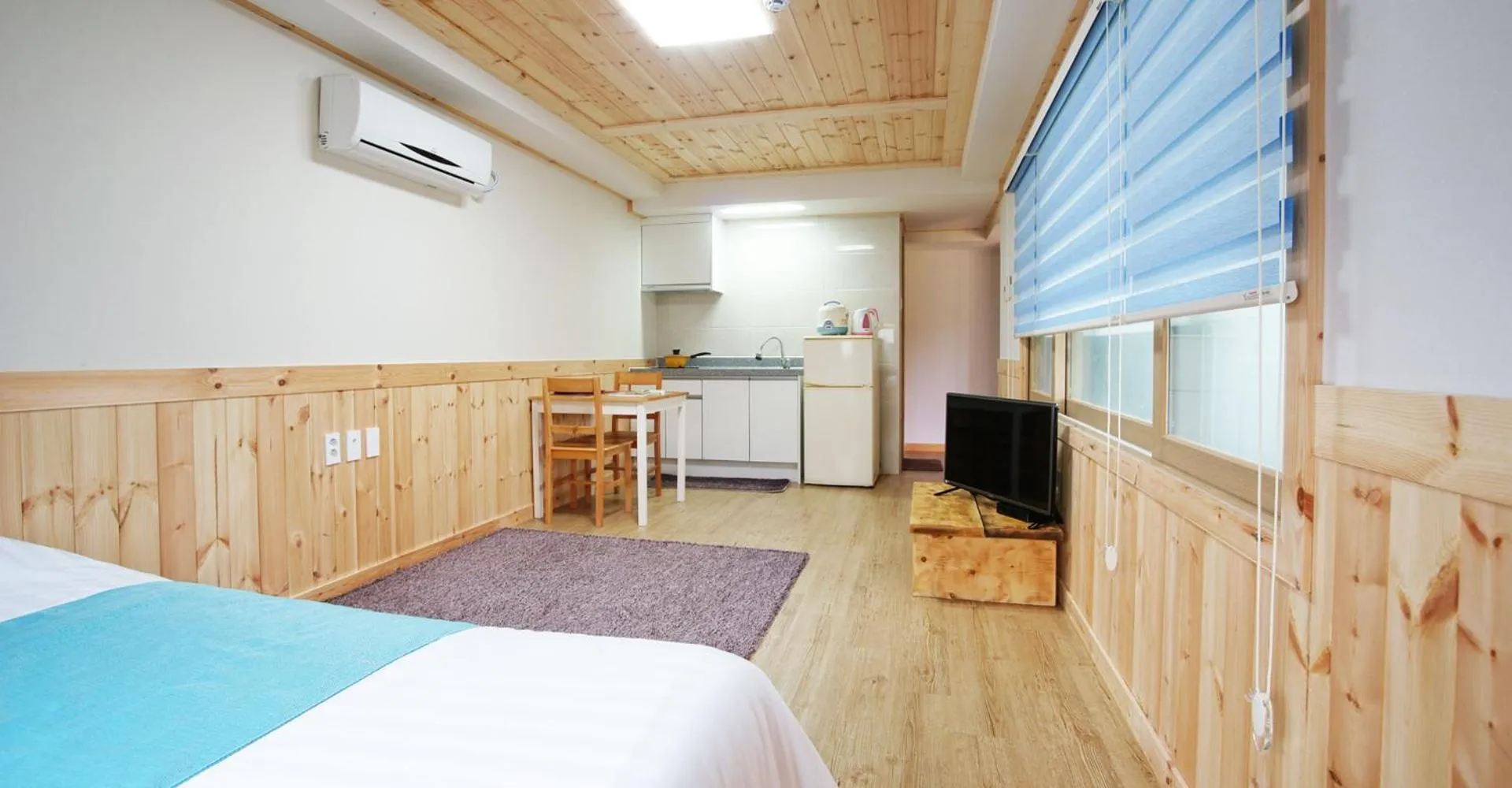 Bed in Gotjawal Geomunoreum Pension