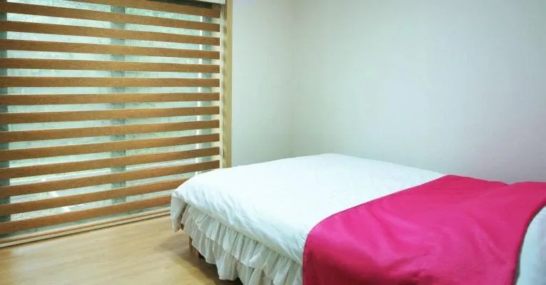 Bed in Gotjawal Geomunoreum Pension