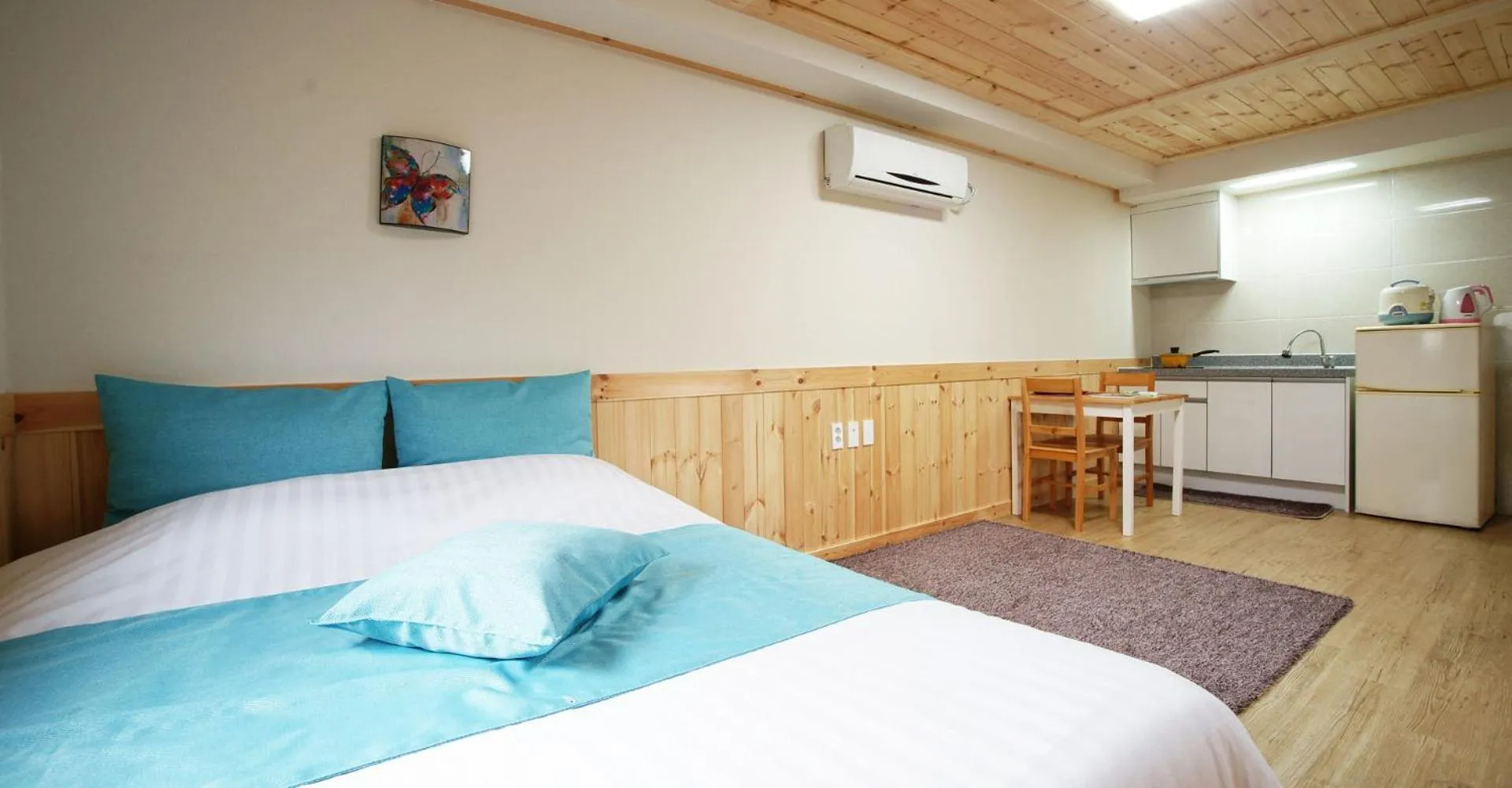 Bed in Gotjawal Geomunoreum Pension