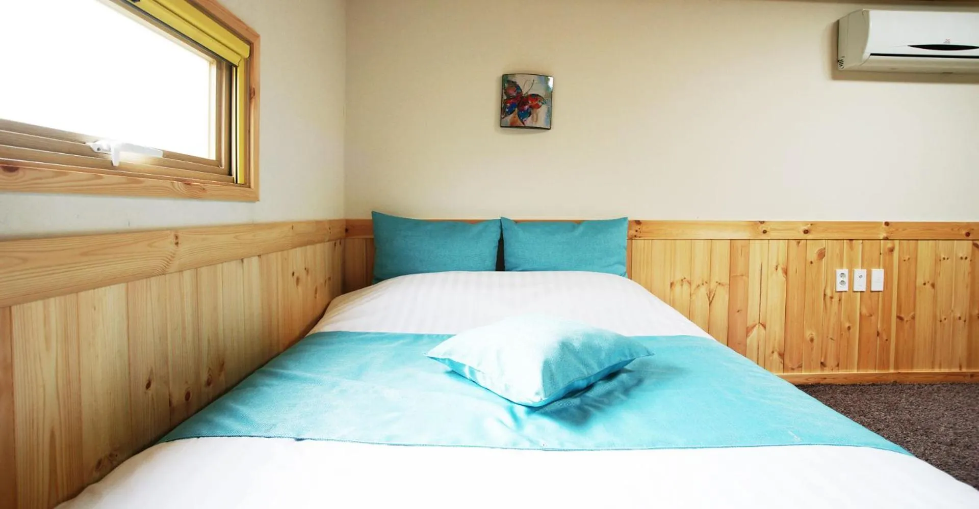 Bed in Gotjawal Geomunoreum Pension