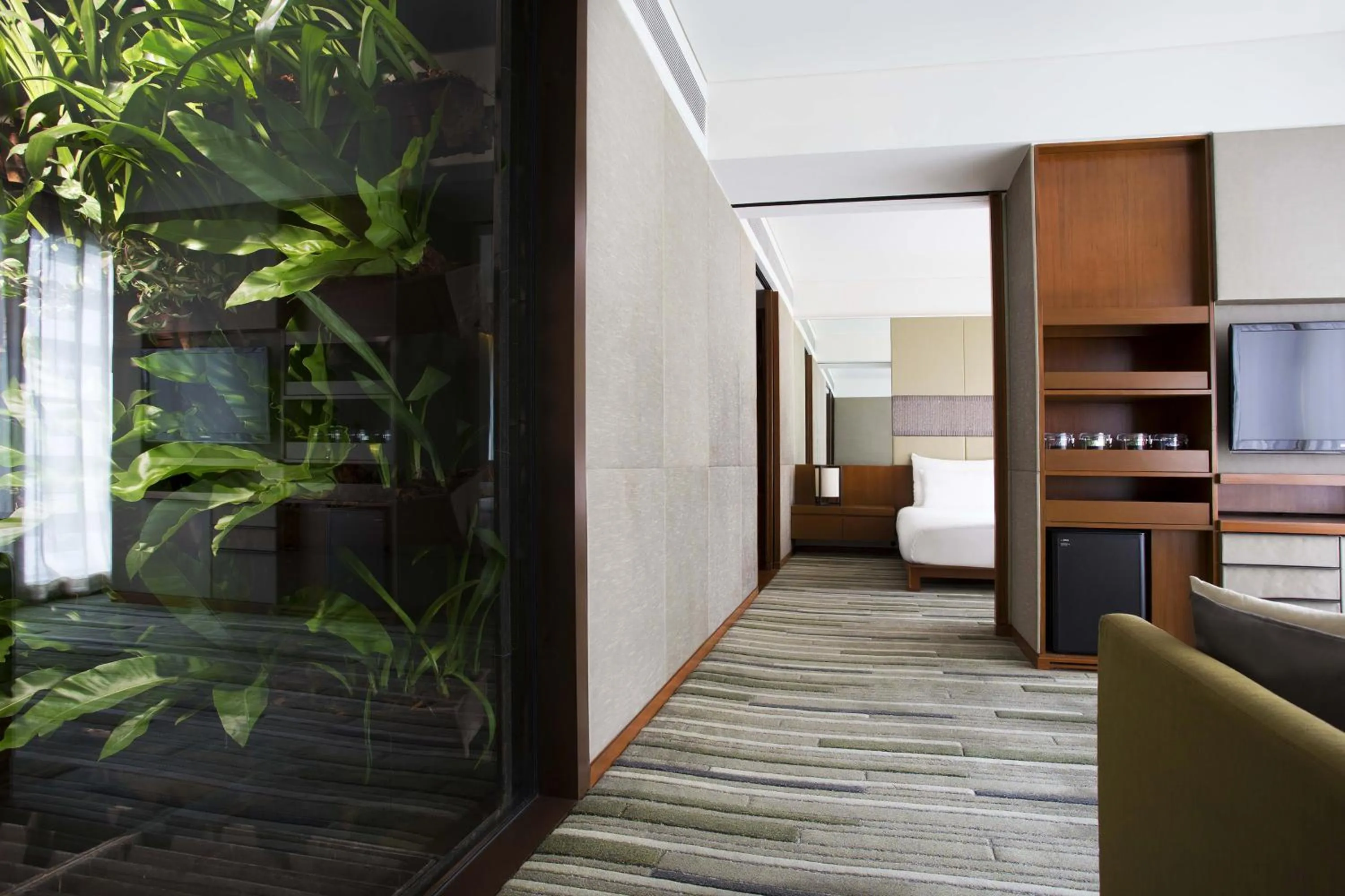 Living room in Hansar Bangkok Hotel