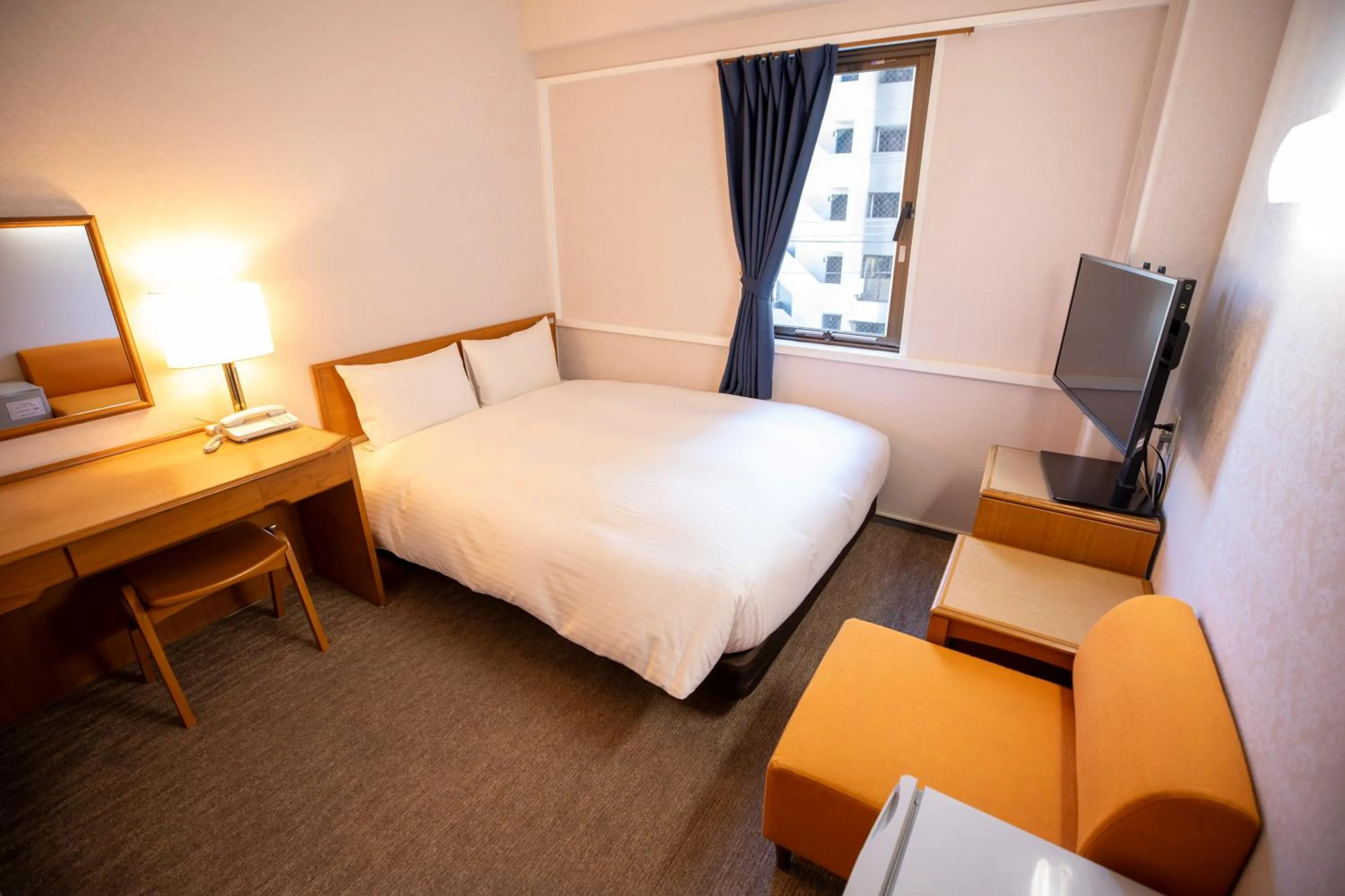 Bed in Hotel New Saitama