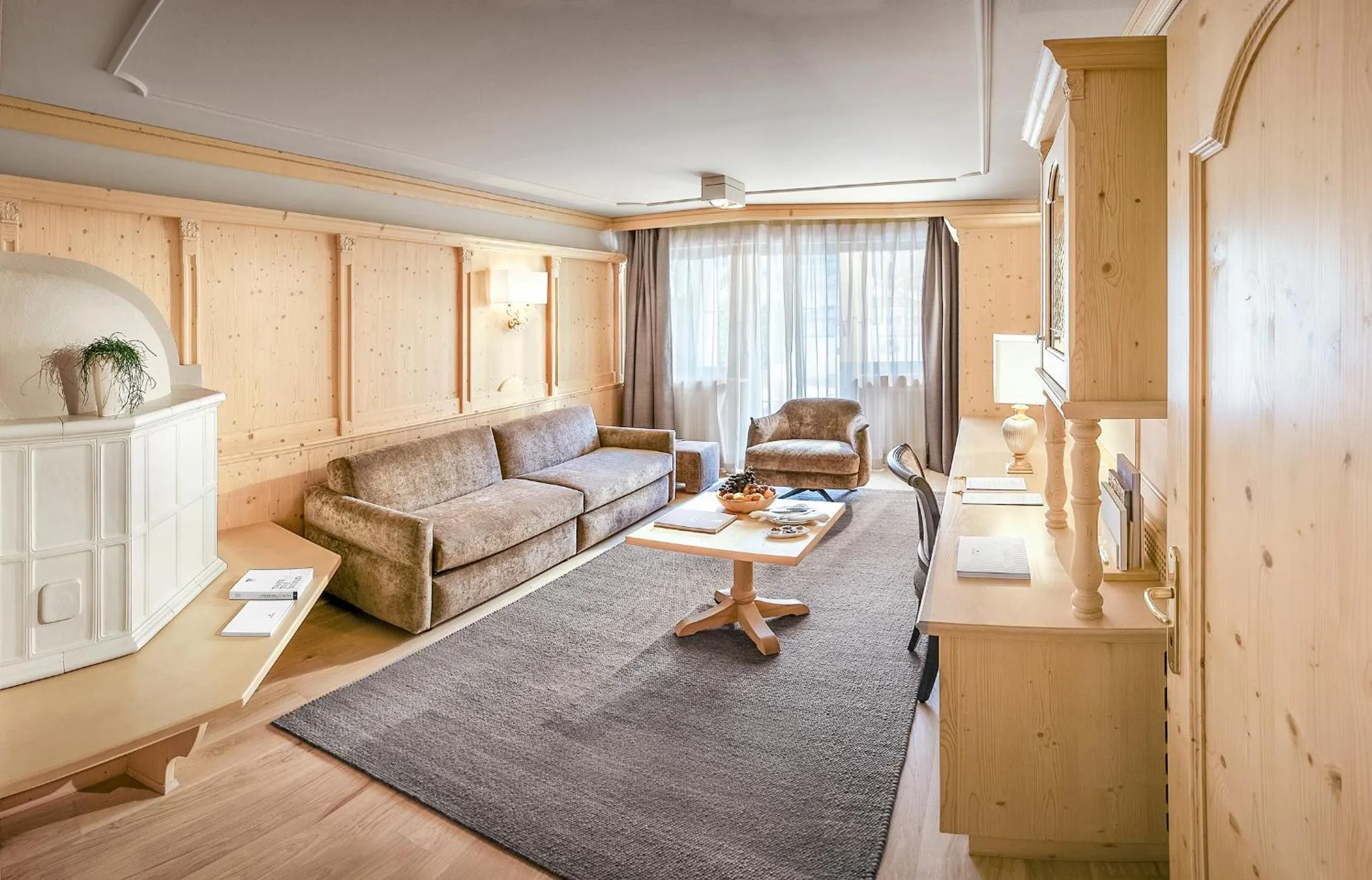 Living room, Bed in Gardena Grödnerhof - Hotel & Spa