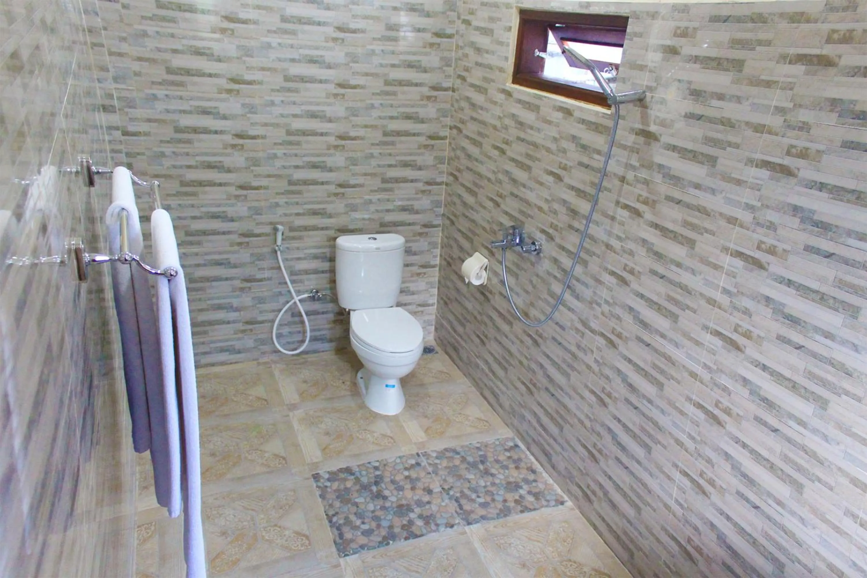 Shower in CR Tris Rooms Seminyak