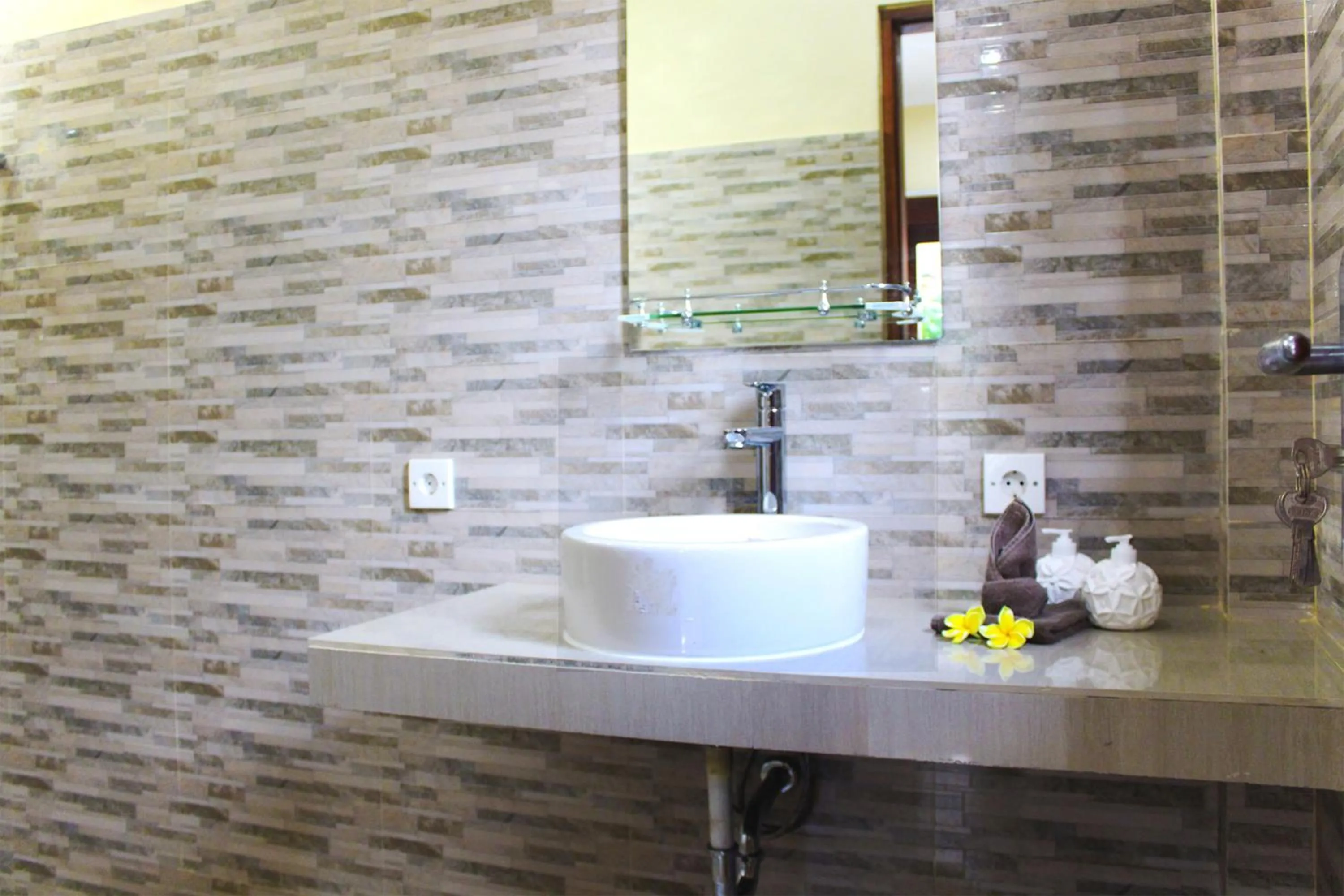 Bathroom in CR Tris Rooms Seminyak