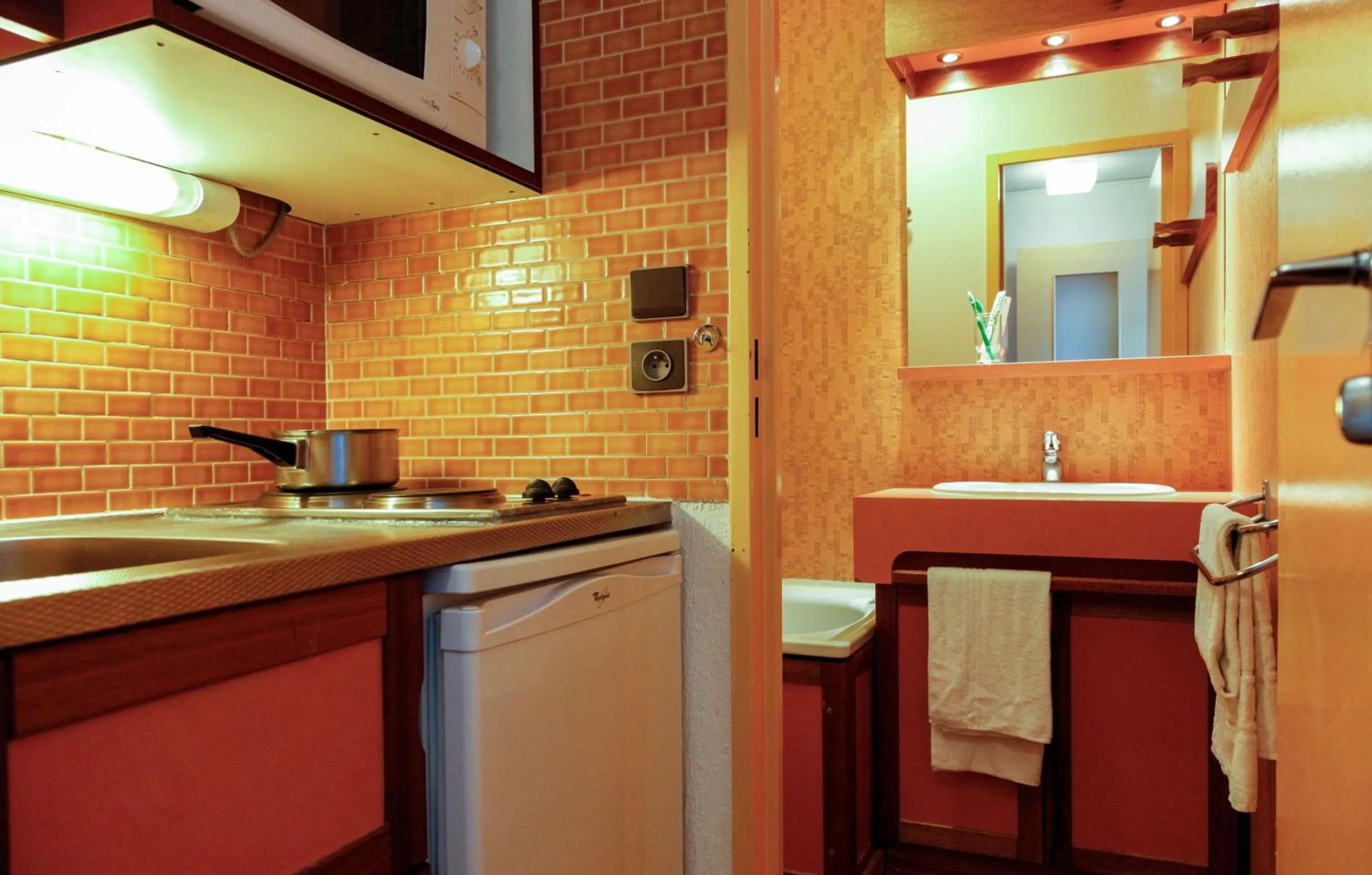 Kitchen or kitchenette in Résidence Odalys Tourotel