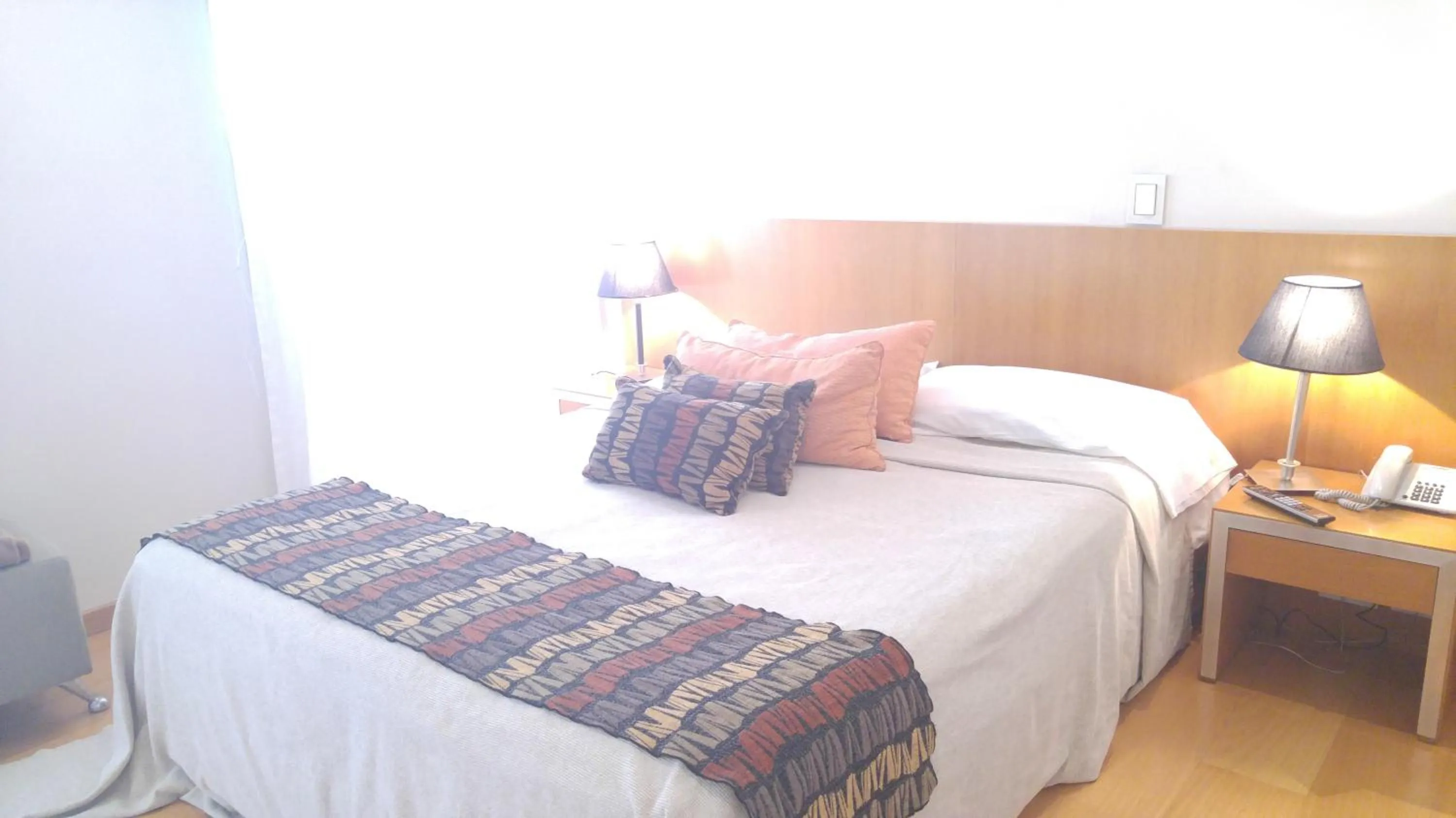 Bed in Telmho Hotel Boutique