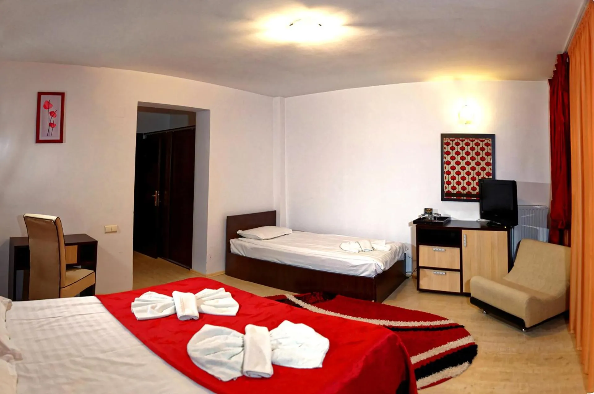 Photo of the whole room, Bed in Hotel boutique Garden Resort by Brancoveanu