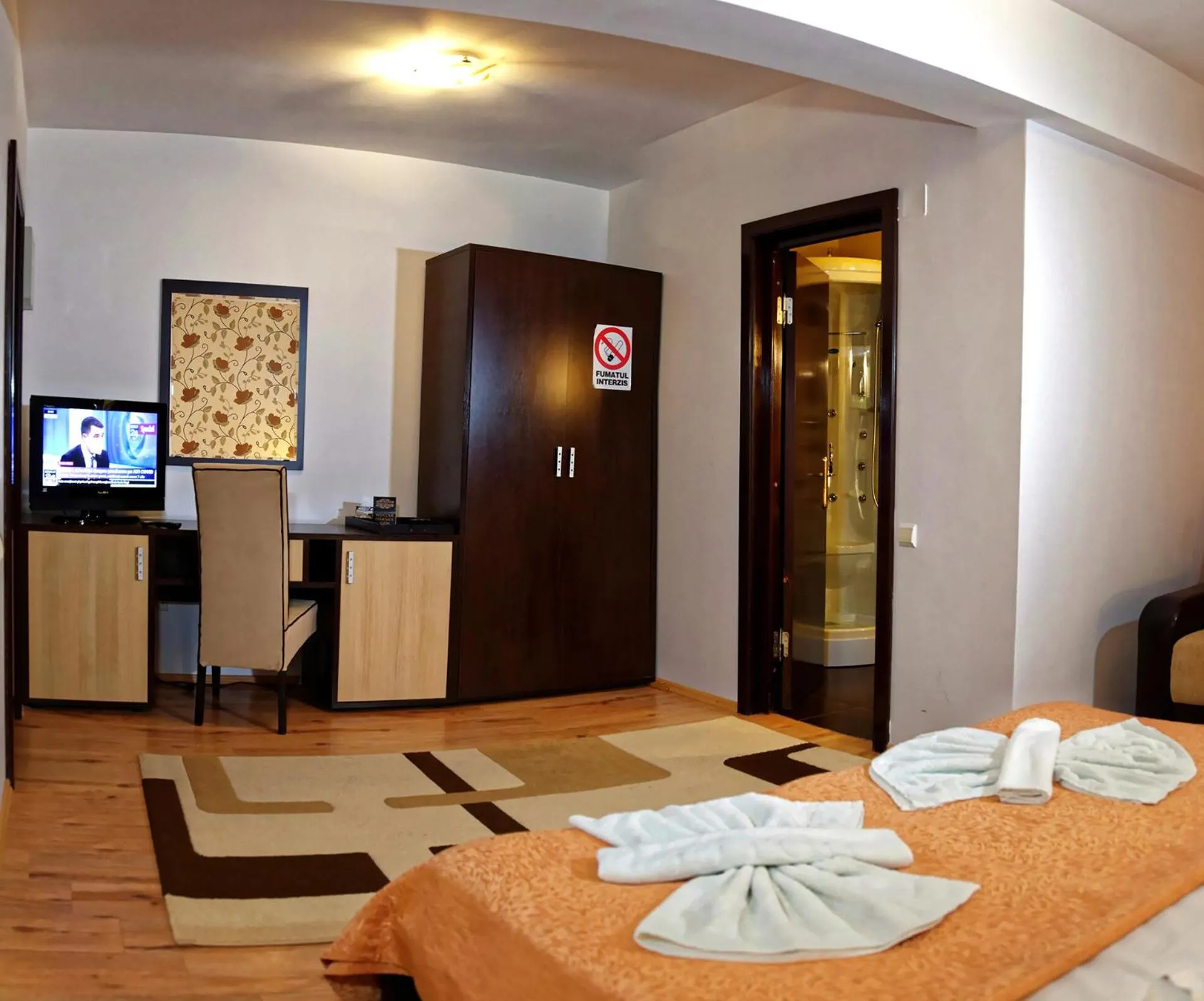 Photo of the whole room, Bed in Hotel boutique Garden Resort by Brancoveanu