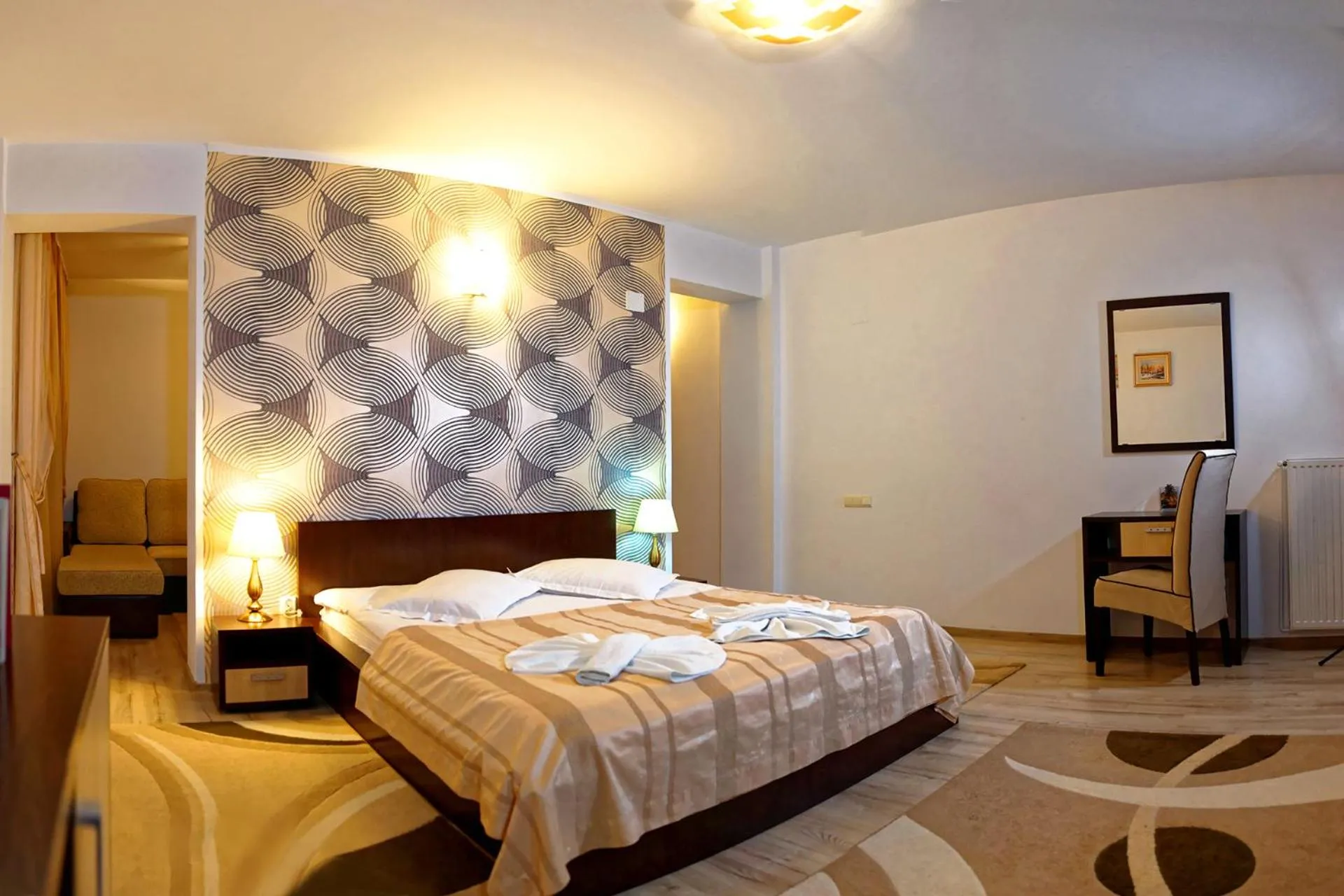 Photo of the whole room, Bed in Hotel boutique Garden Resort by Brancoveanu