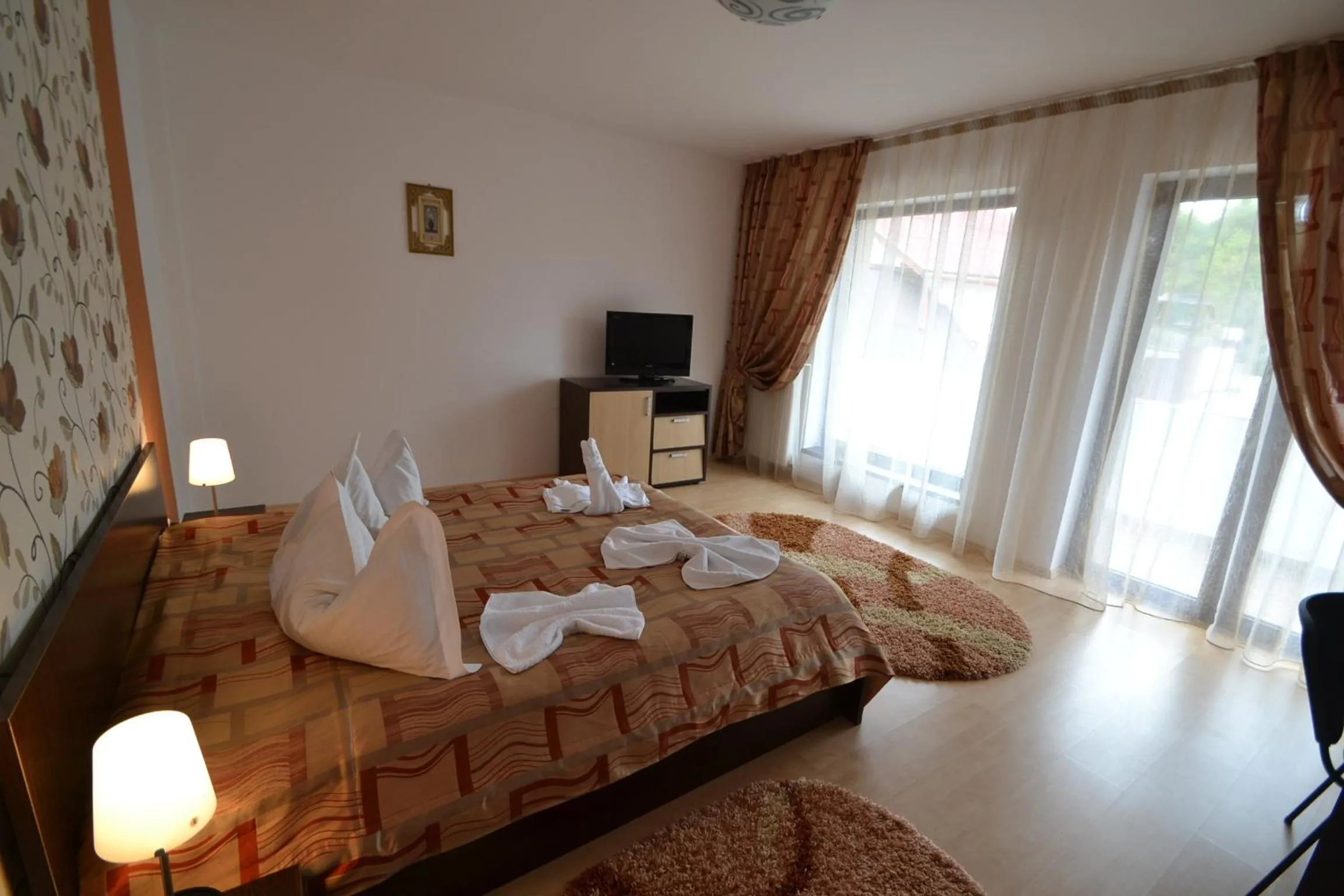 Bed in Hotel boutique Garden Resort by Brancoveanu