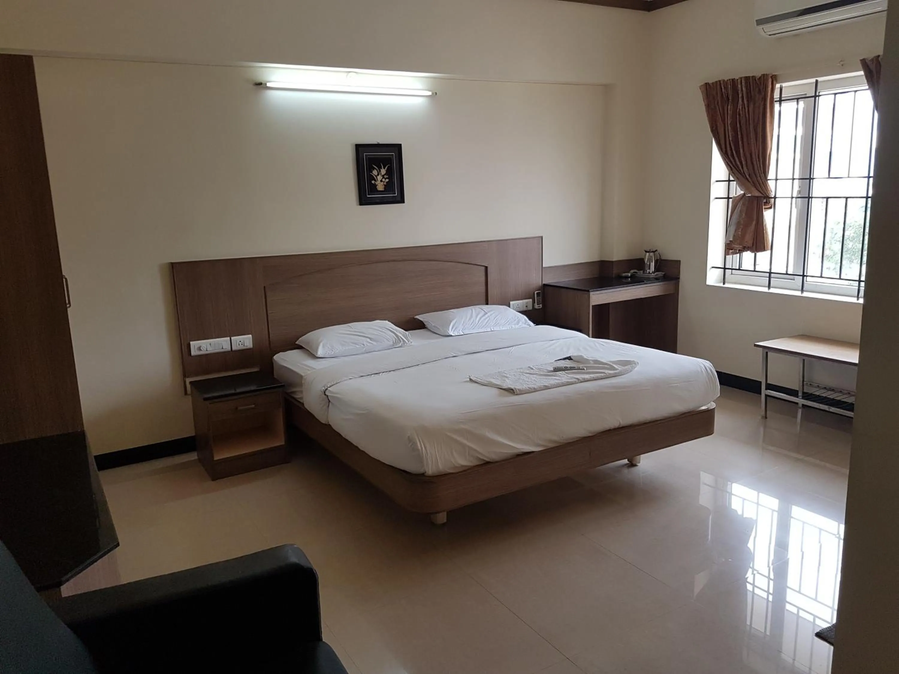 Photo of the whole room, Bed in SK Residency