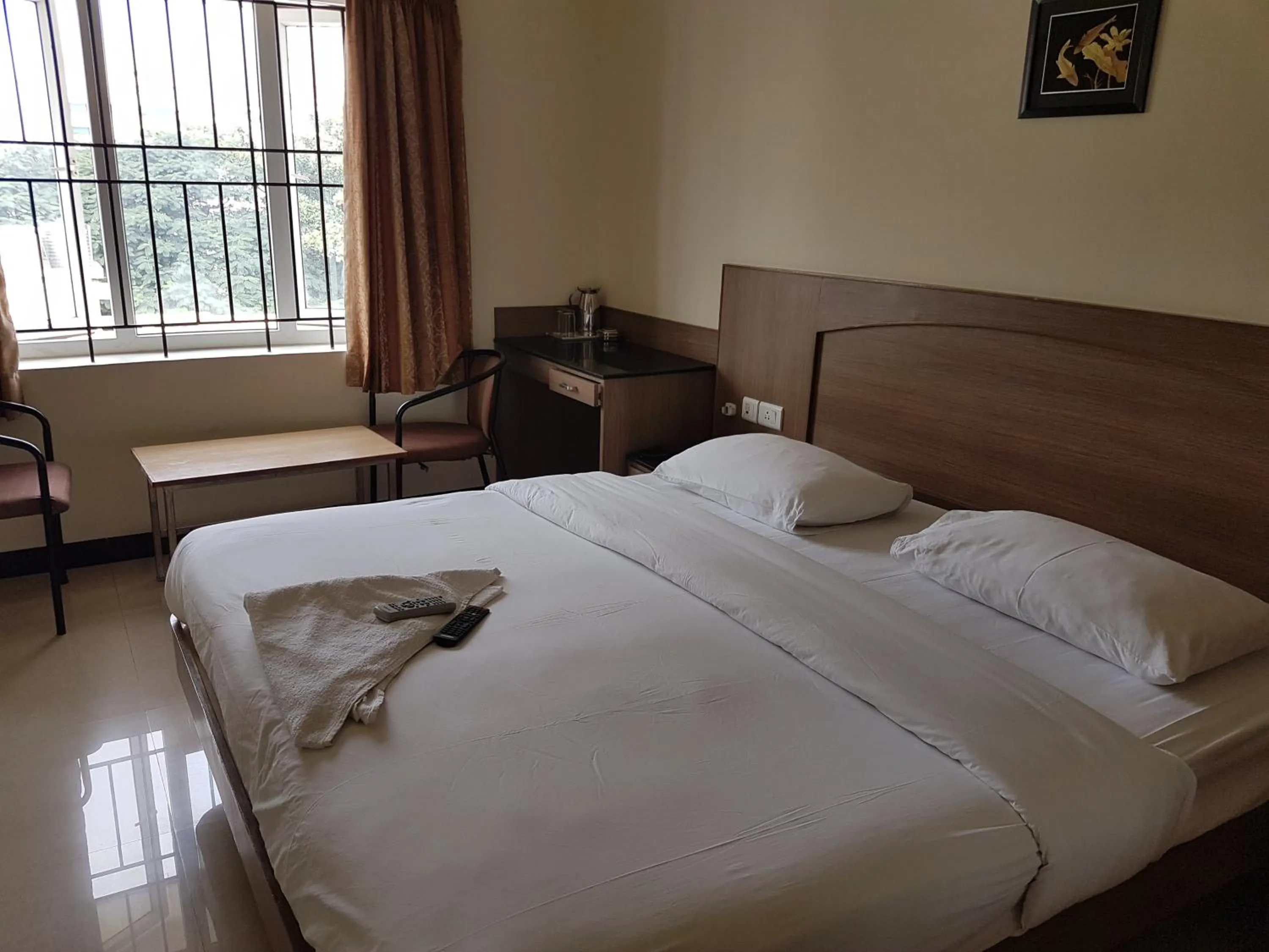 Bed in SK Residency