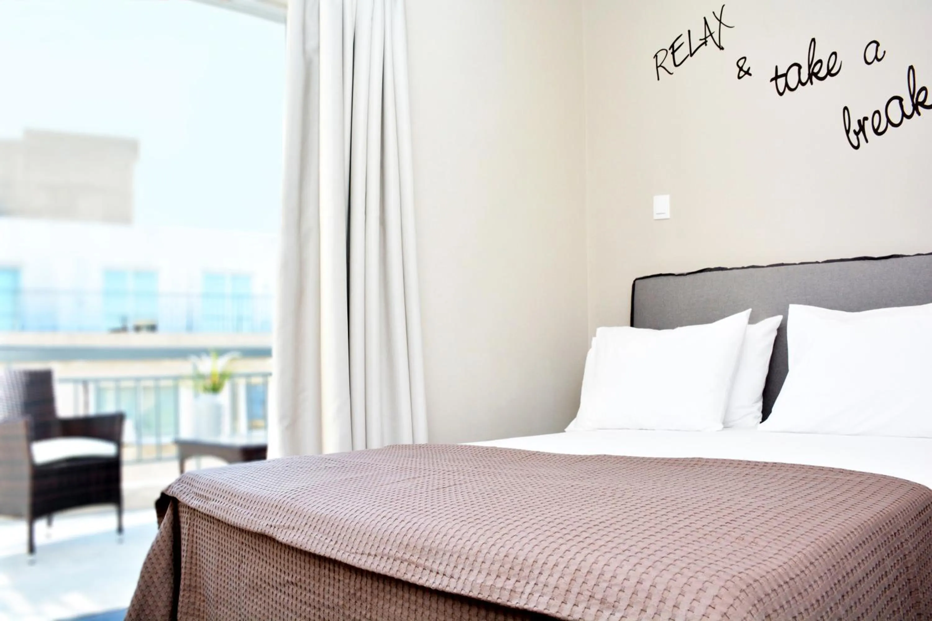 Bed in Athens Connection Apartments