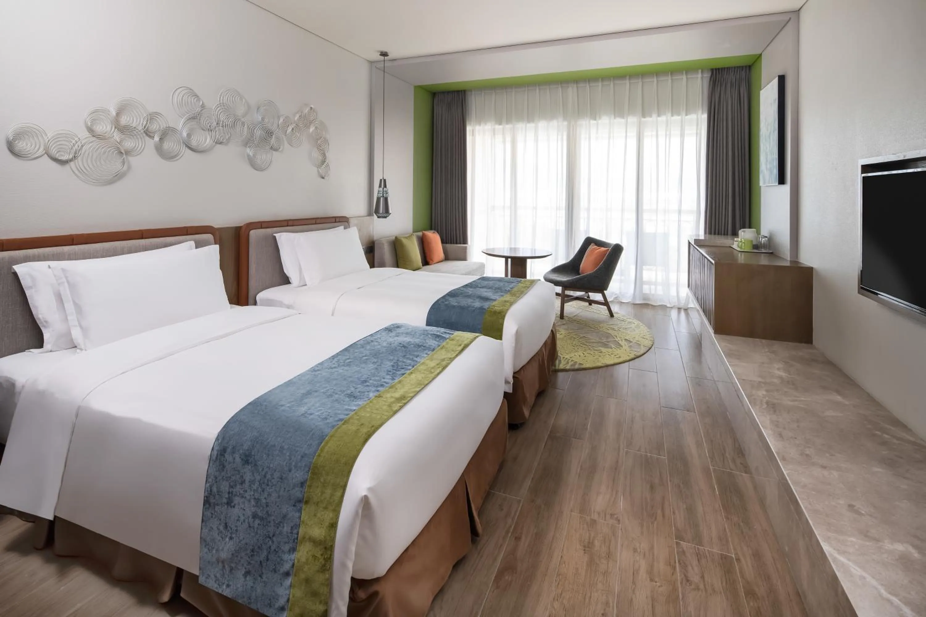 Bed in Holiday Inn Resort Sanya Bay by IHG