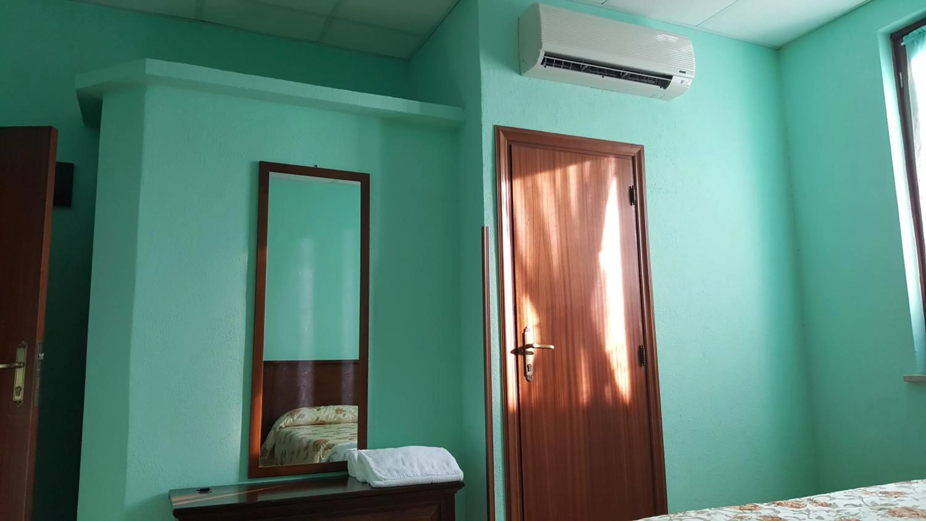 Bedroom in Locanda B&B Momo