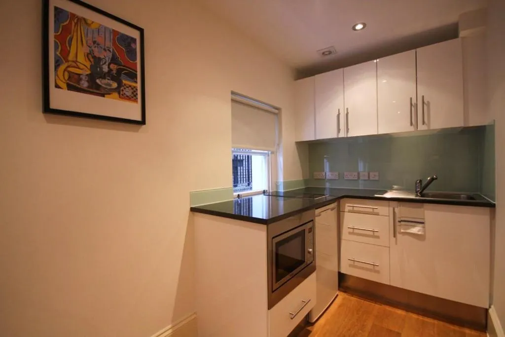 Kitchen or kitchenette in Paddington Green Serviced Apartments by Concept Apartments