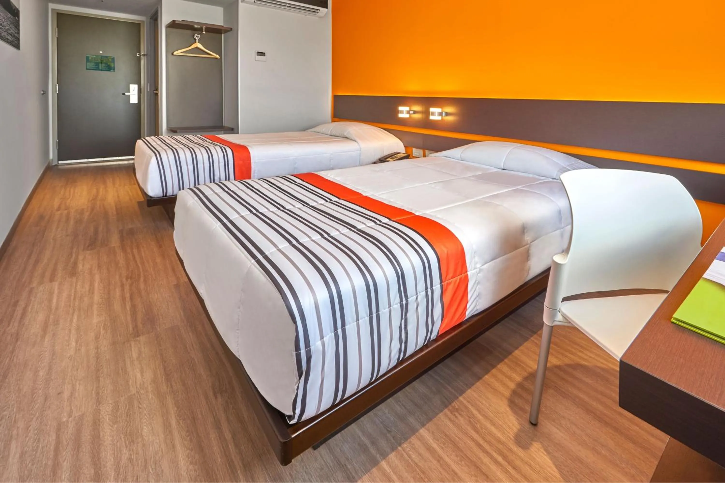 Photo of the whole room, Bed in City Express Junior by Marriott Tuxtepec