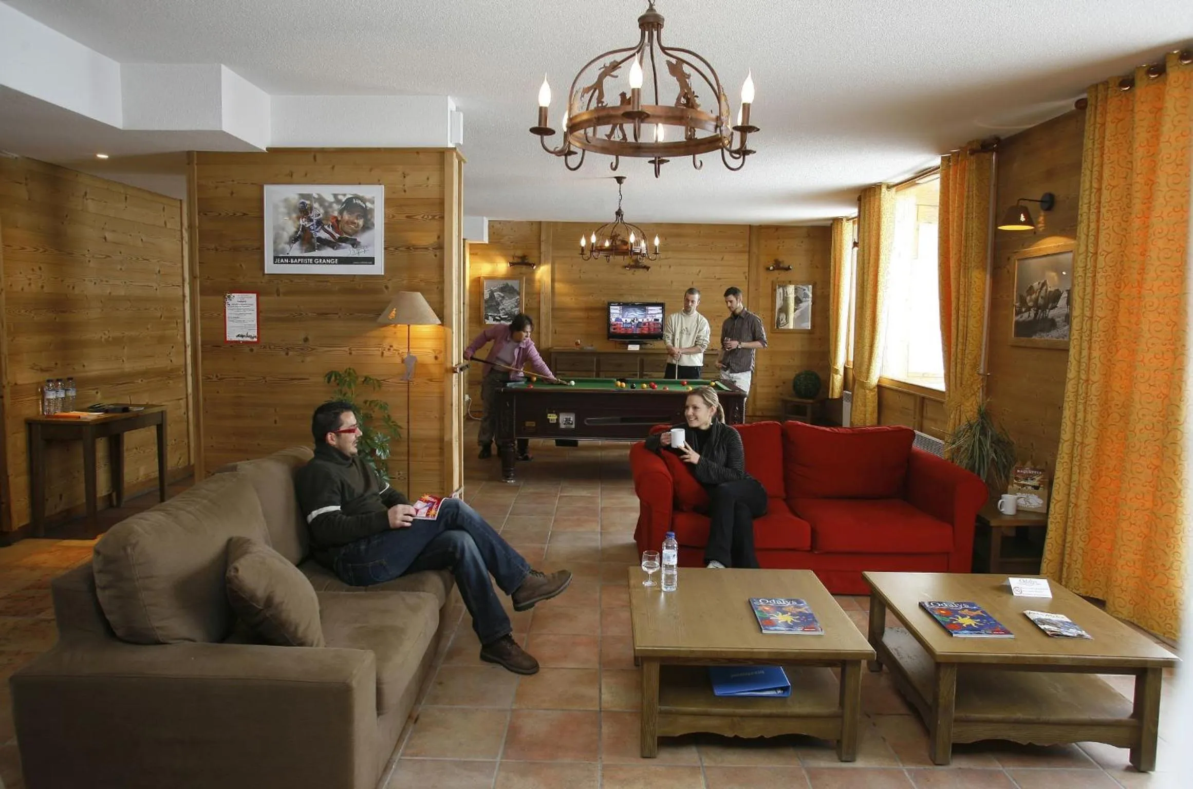 Communal lounge/ TV room in Résidence Odalys Le Hameau et les Chalets de la Vallée d'Or