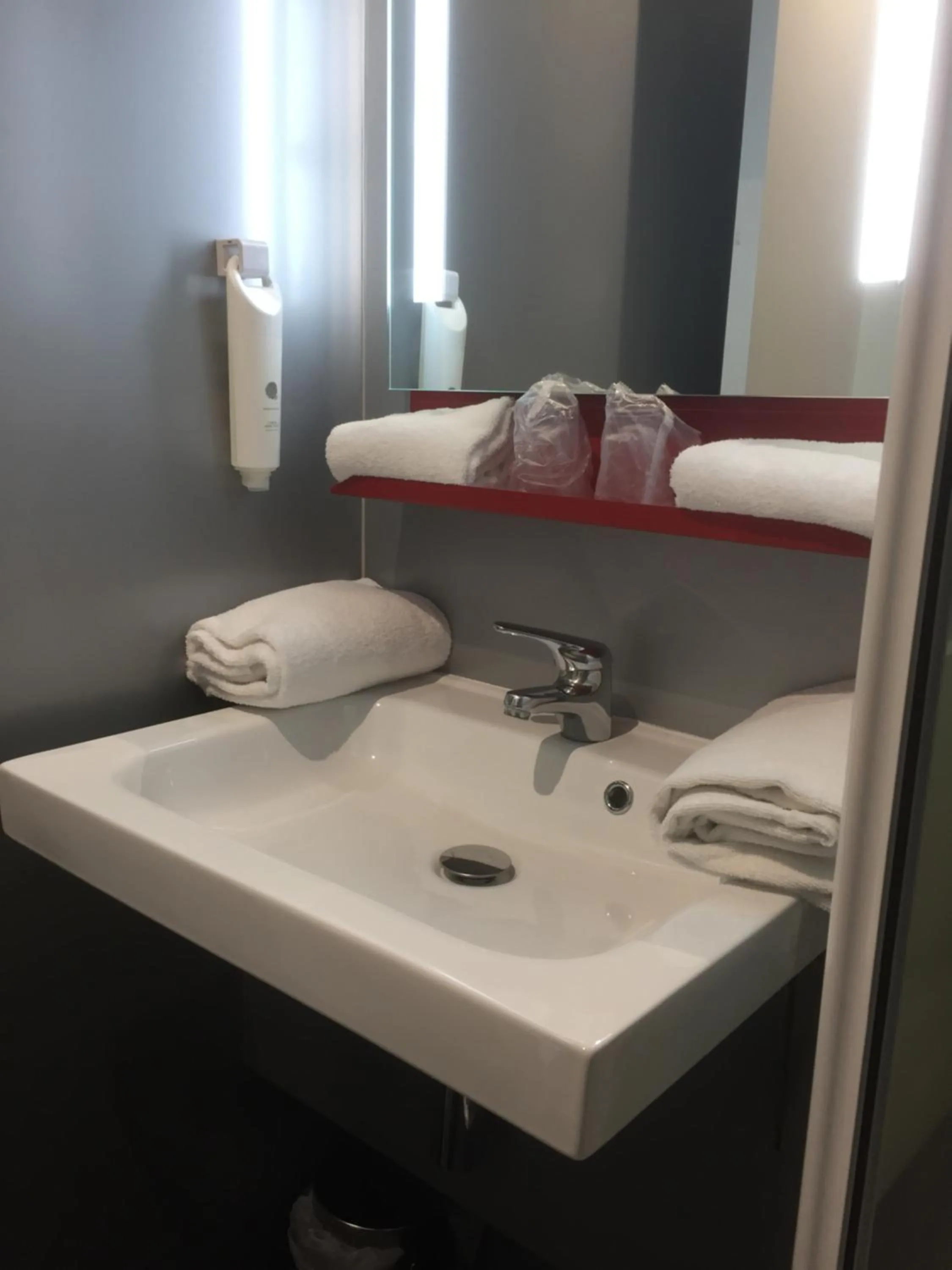 Bathroom in Enzo Hotels Trappes by Kyriad Direct