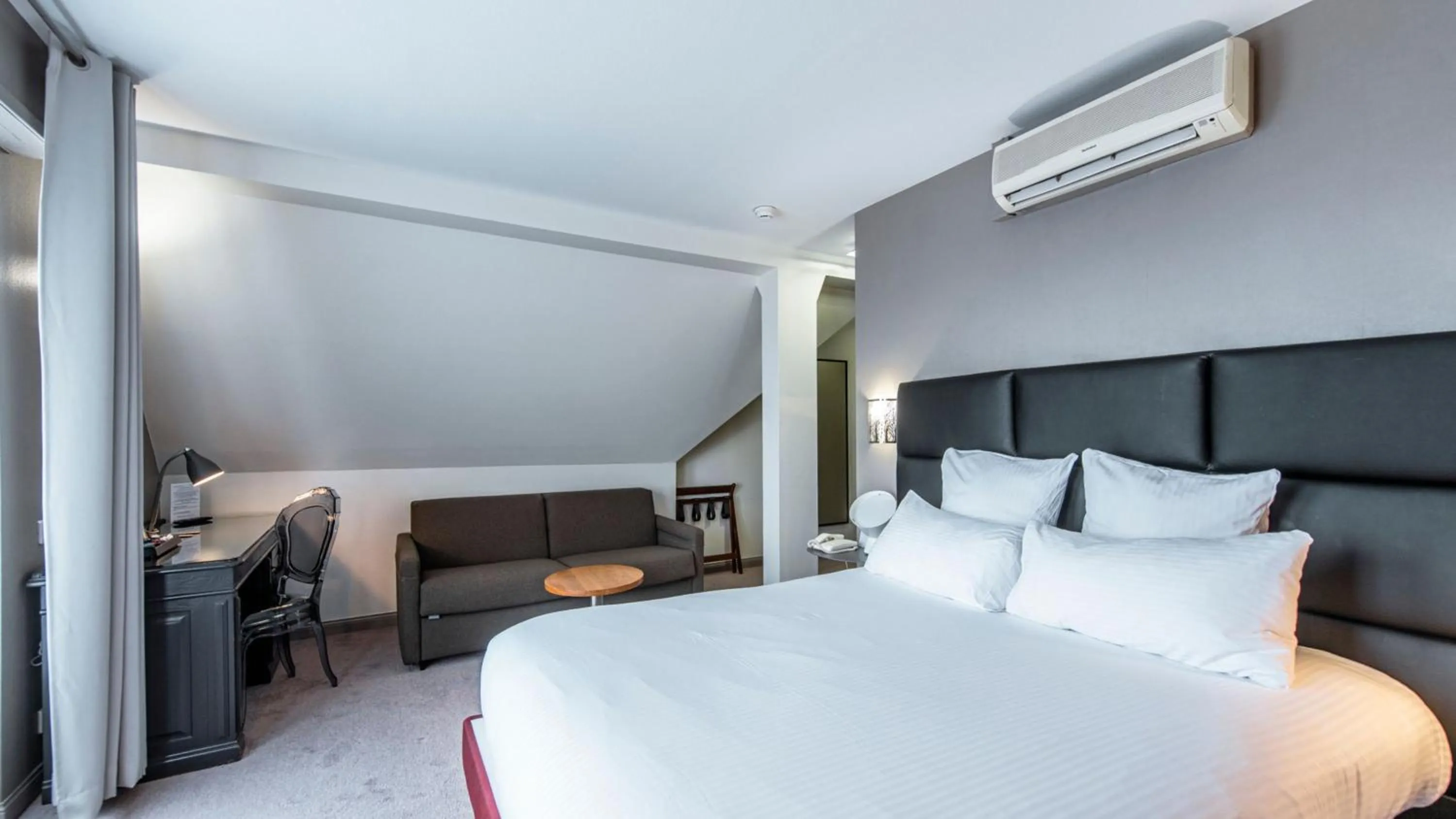 Bed in Best Western Plus Au cheval Blanc à Mulhouse