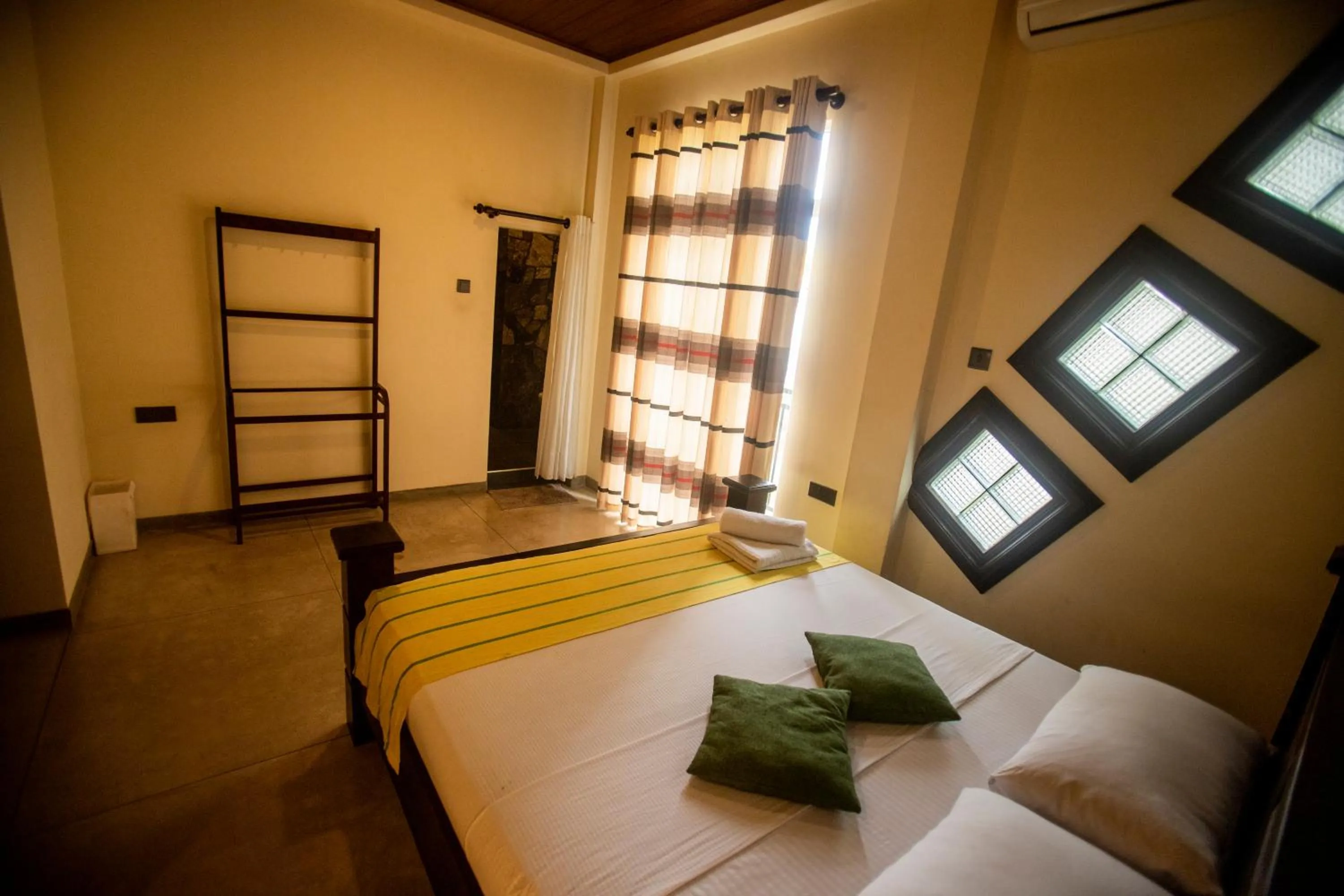 Bed in Evergreen Hotel Dambulla