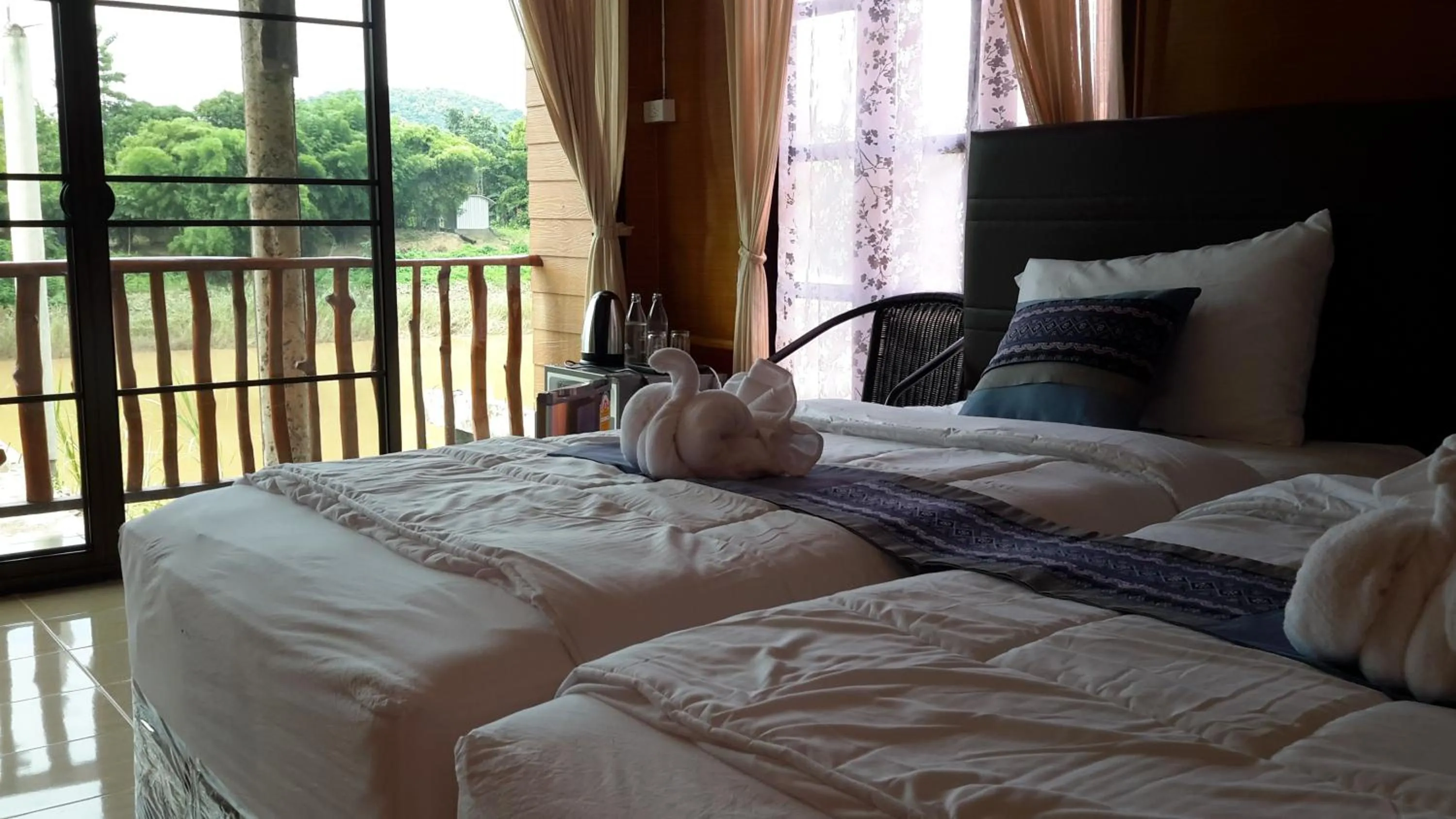 Bed in Sisatchanalai Heritage Resort