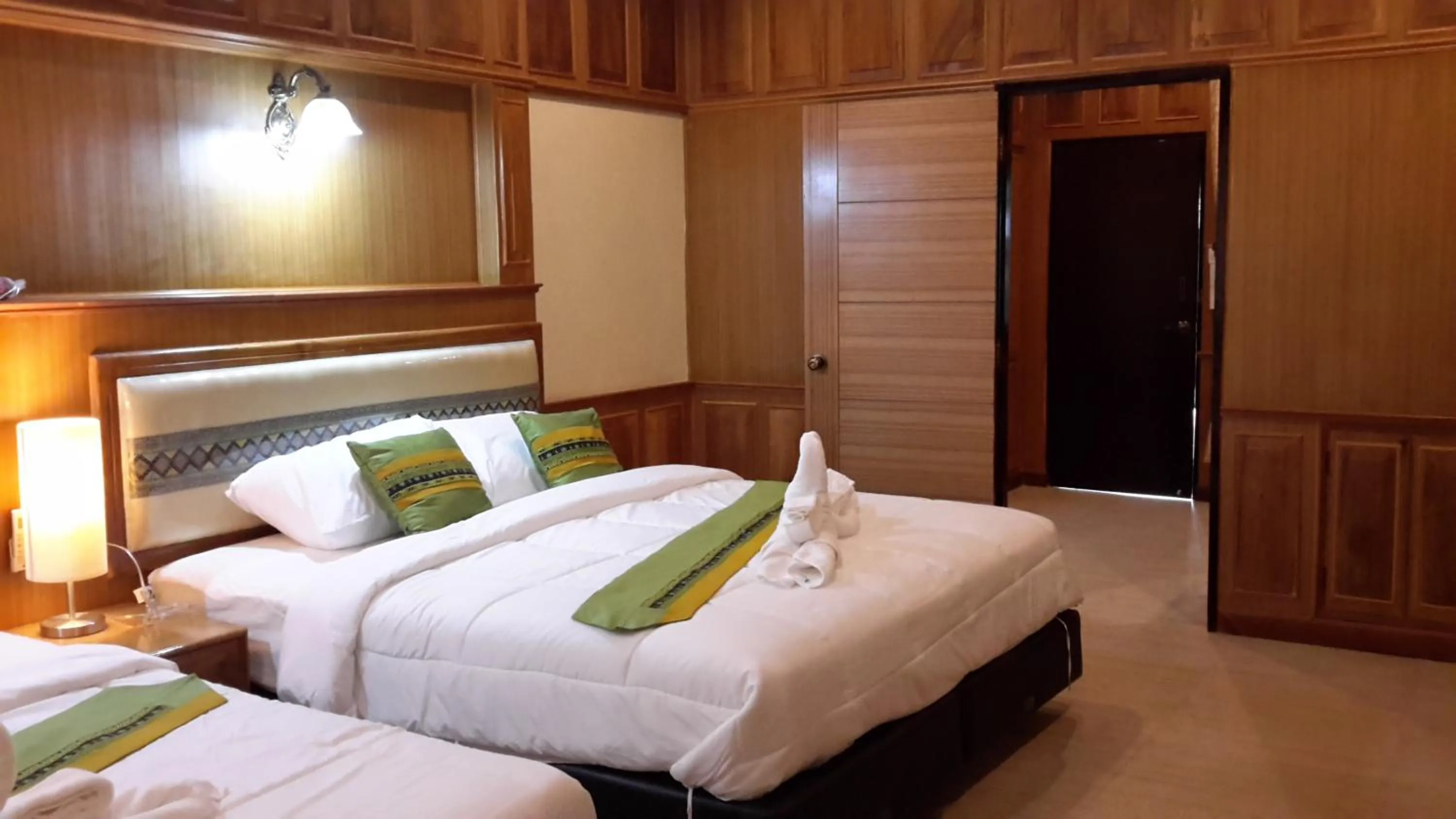 Bed in Sisatchanalai Heritage Resort