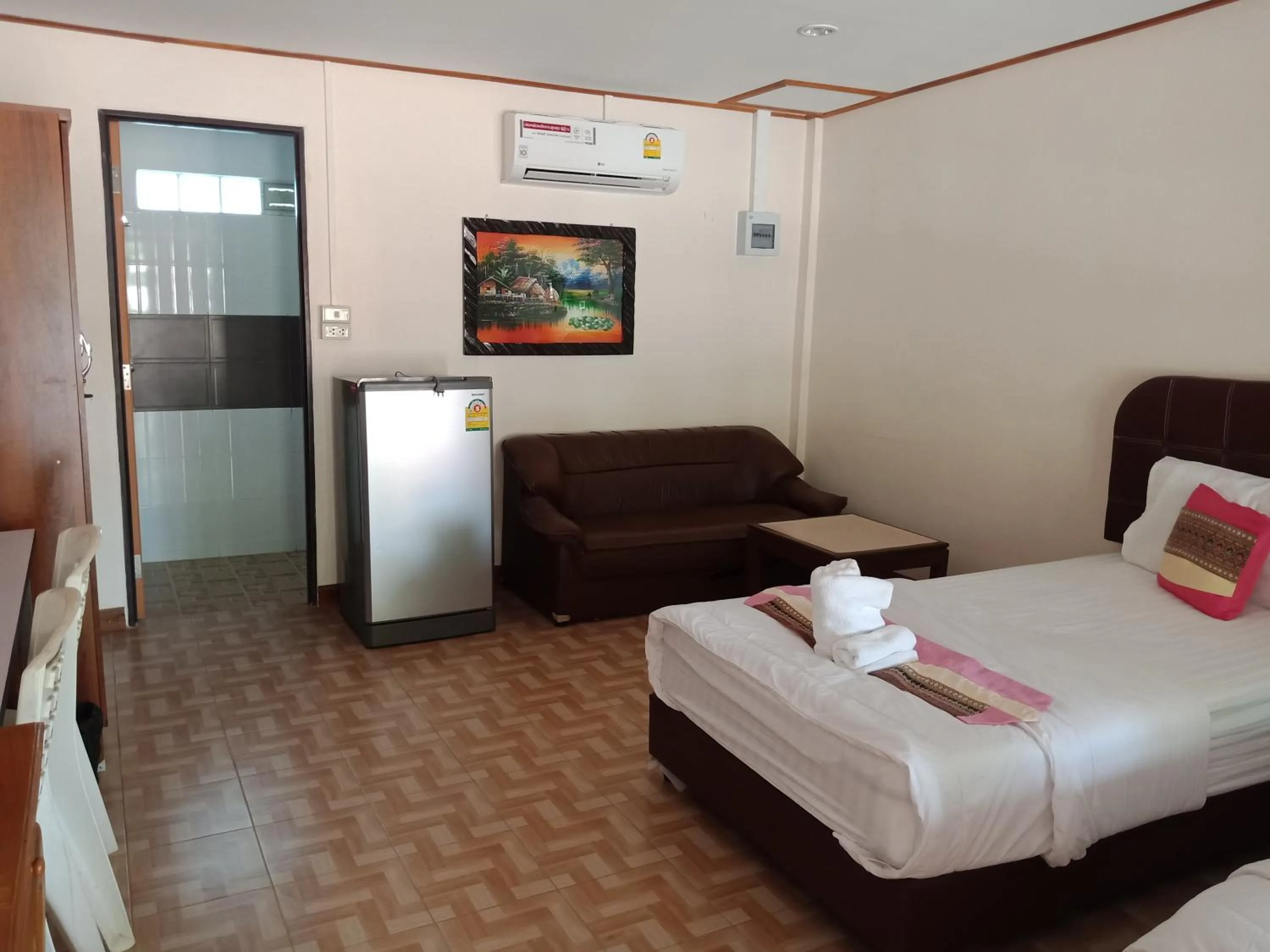 Bed in Sisatchanalai Heritage Resort