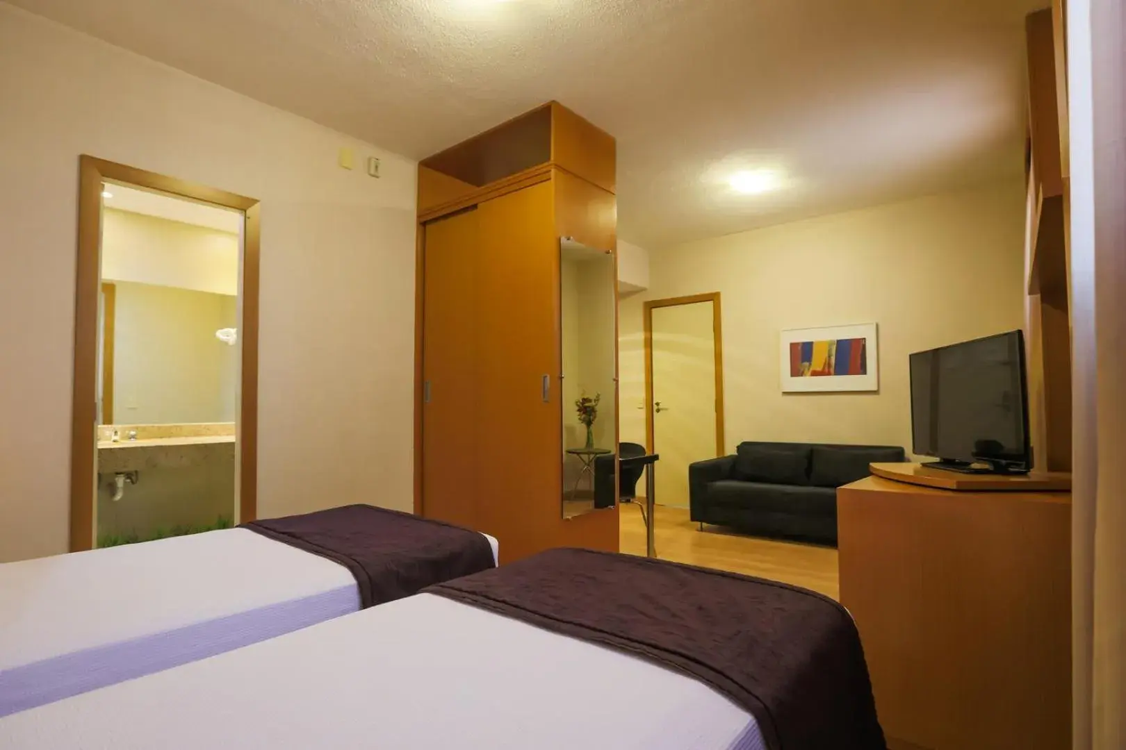 Photo of the whole room, Bed in Nobile Suítes Uberlândia Photo of the whole room, Bed in Nobile Suítes Uberlândia