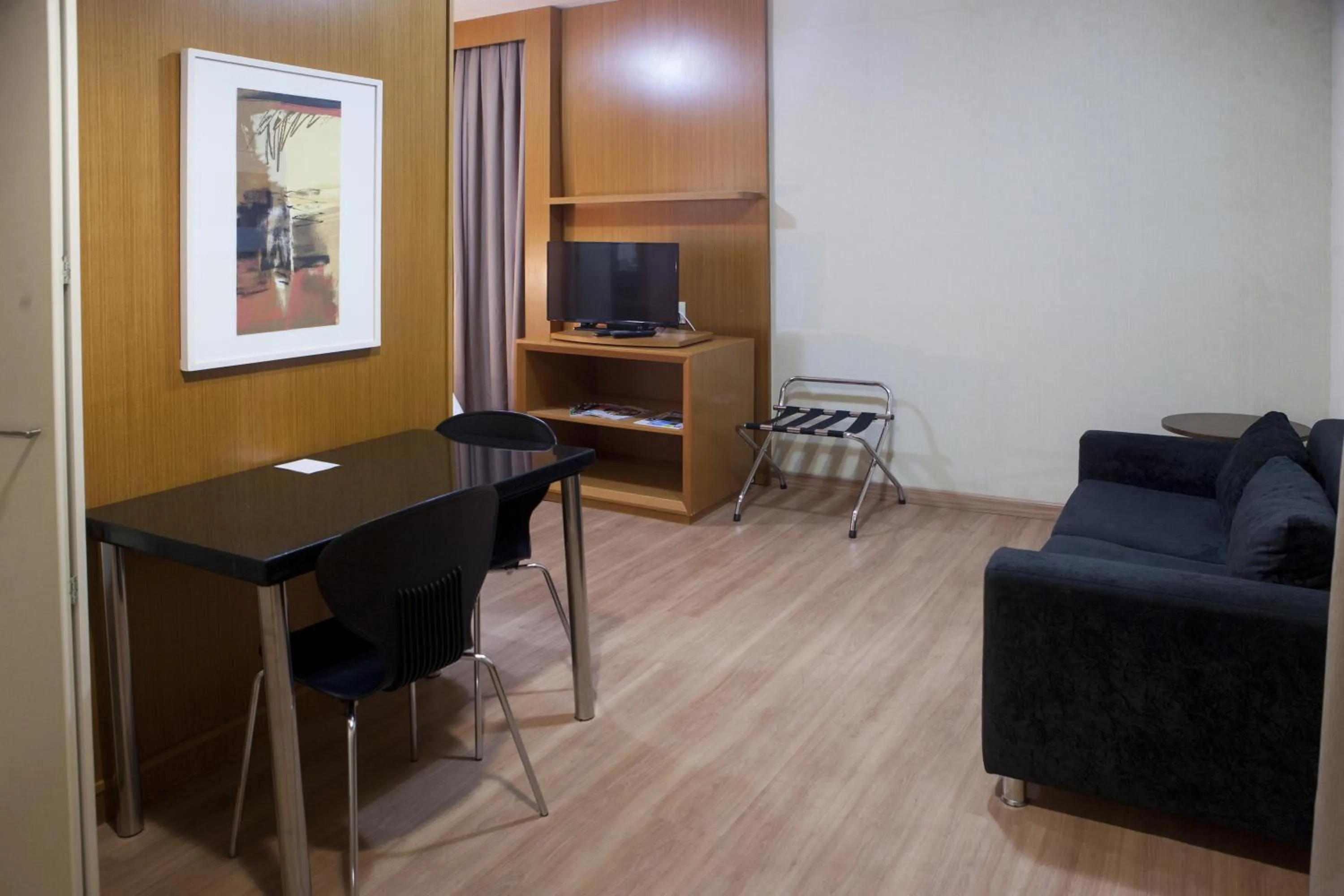 Bedroom in Nobile Suítes Uberlândia