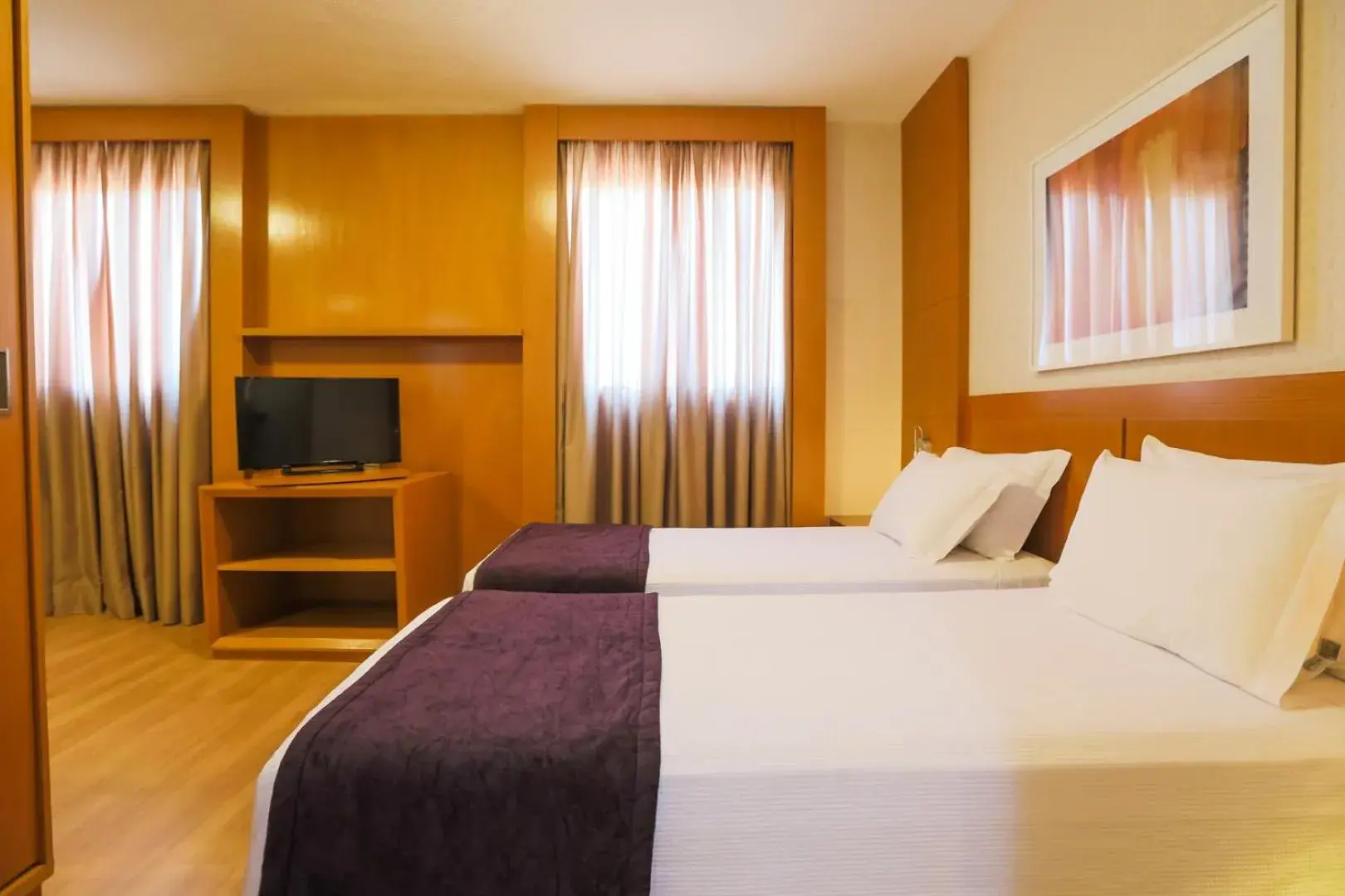 Photo of the whole room, Bed in Nobile Suítes Uberlândia Photo of the whole room, Bed in Nobile Suítes Uberlândia
