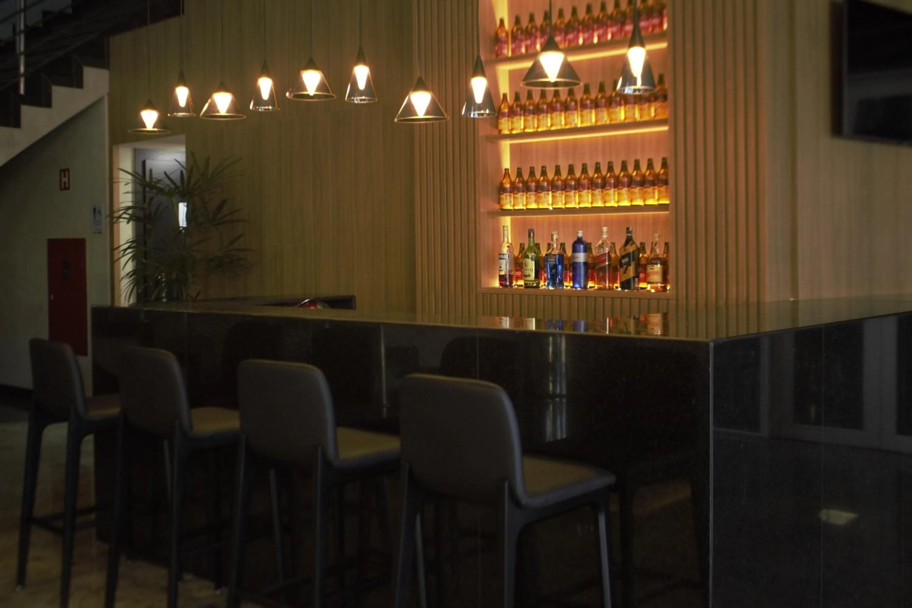 Lounge or bar in San Diego Suites Ipatinga