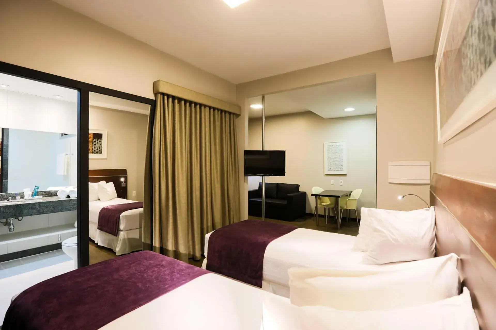 TV and multimedia, Bed in San Diego Suites Ipatinga TV and multimedia, Bed in San Diego Suites Ipatinga