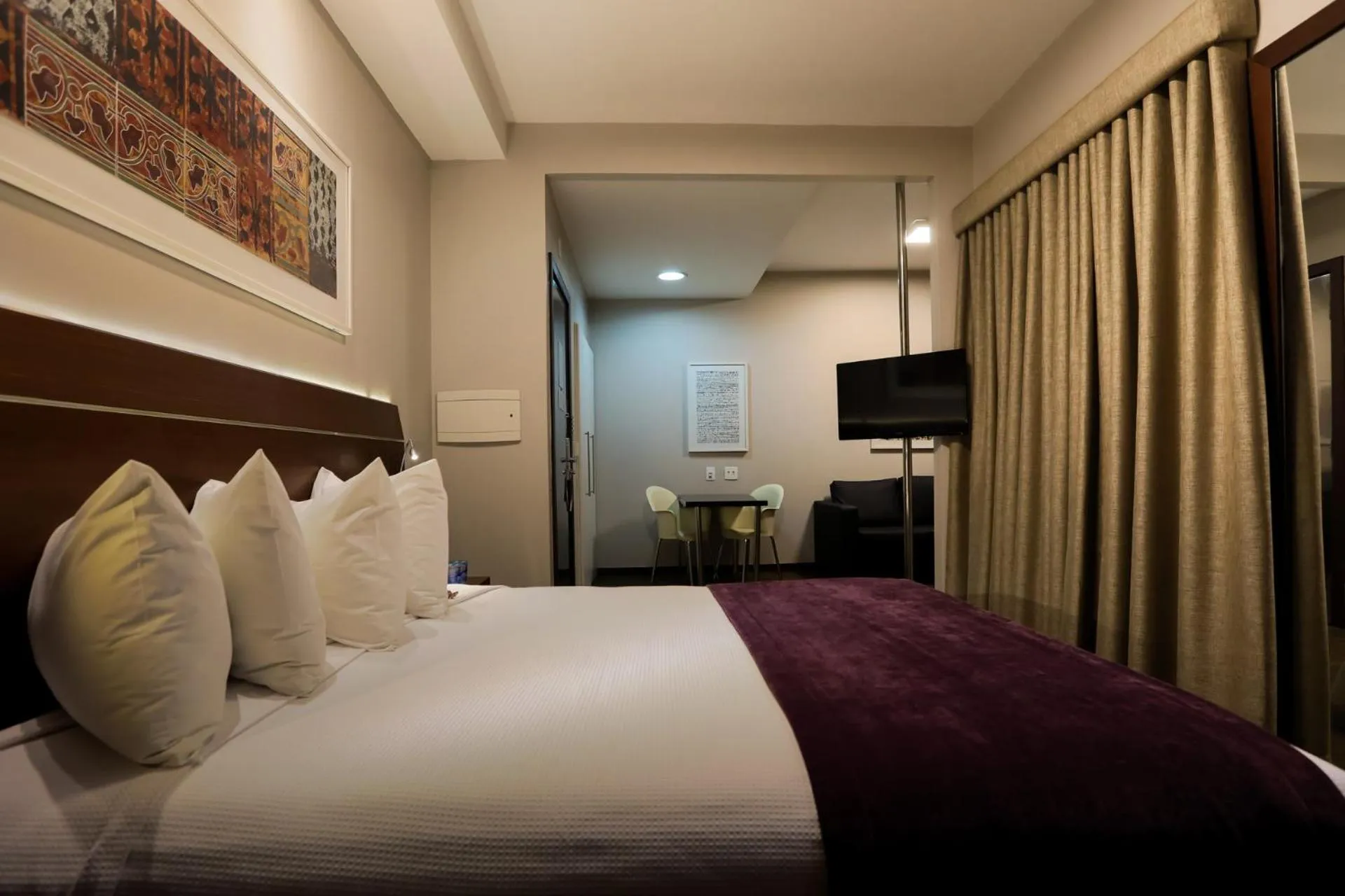 Bed in San Diego Suites Ipatinga