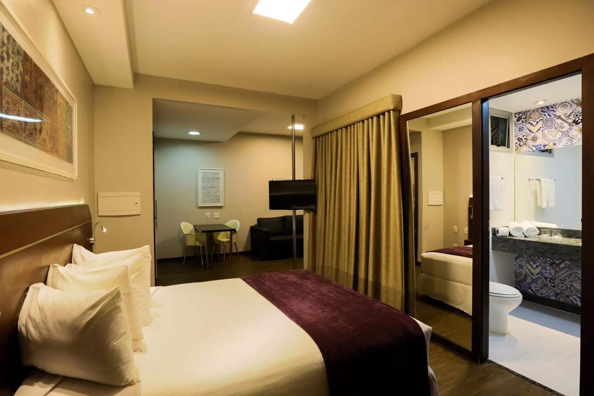 Bed in San Diego Suites Ipatinga