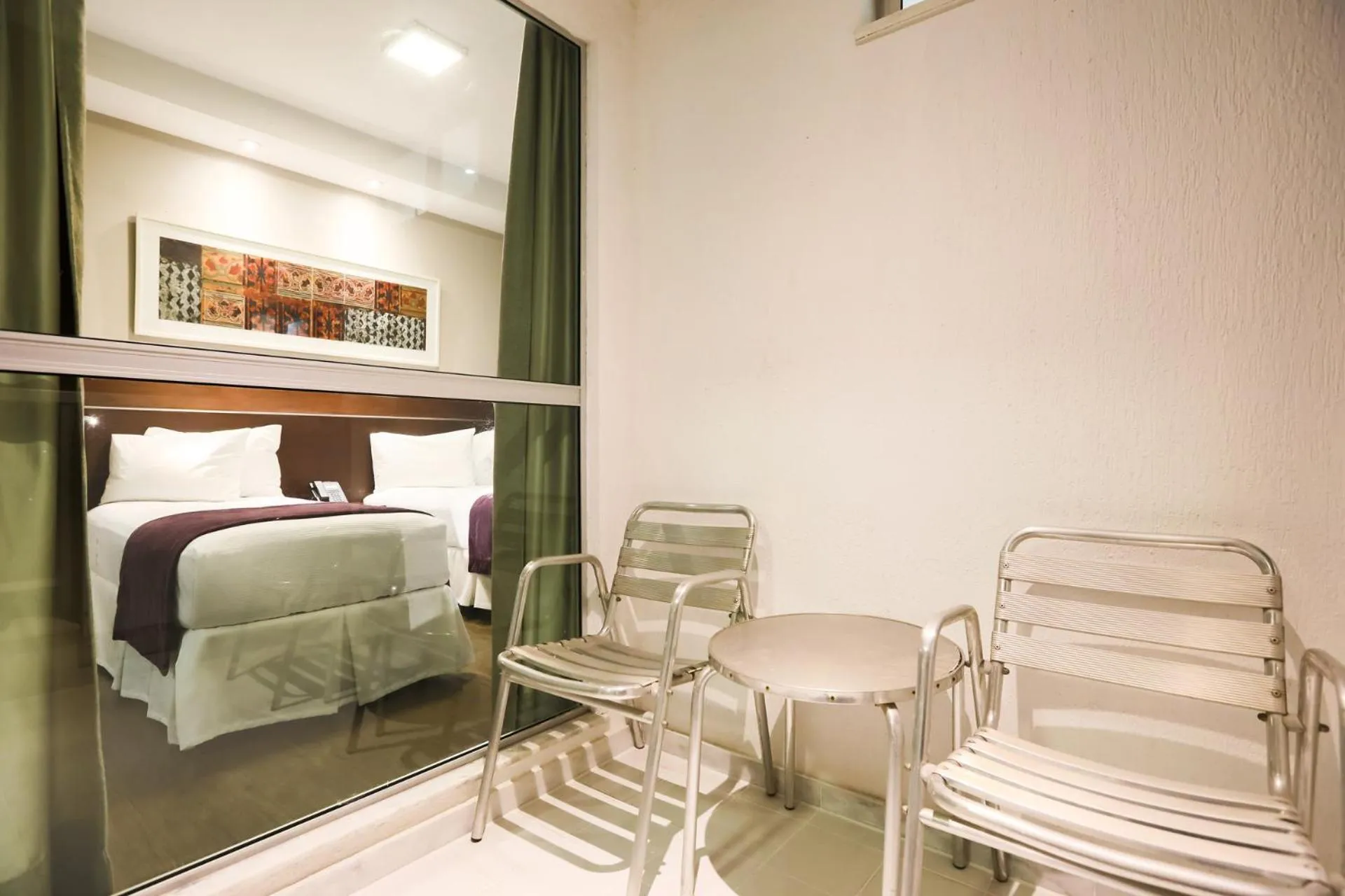 Balcony/Terrace, Bed in San Diego Suites Ipatinga