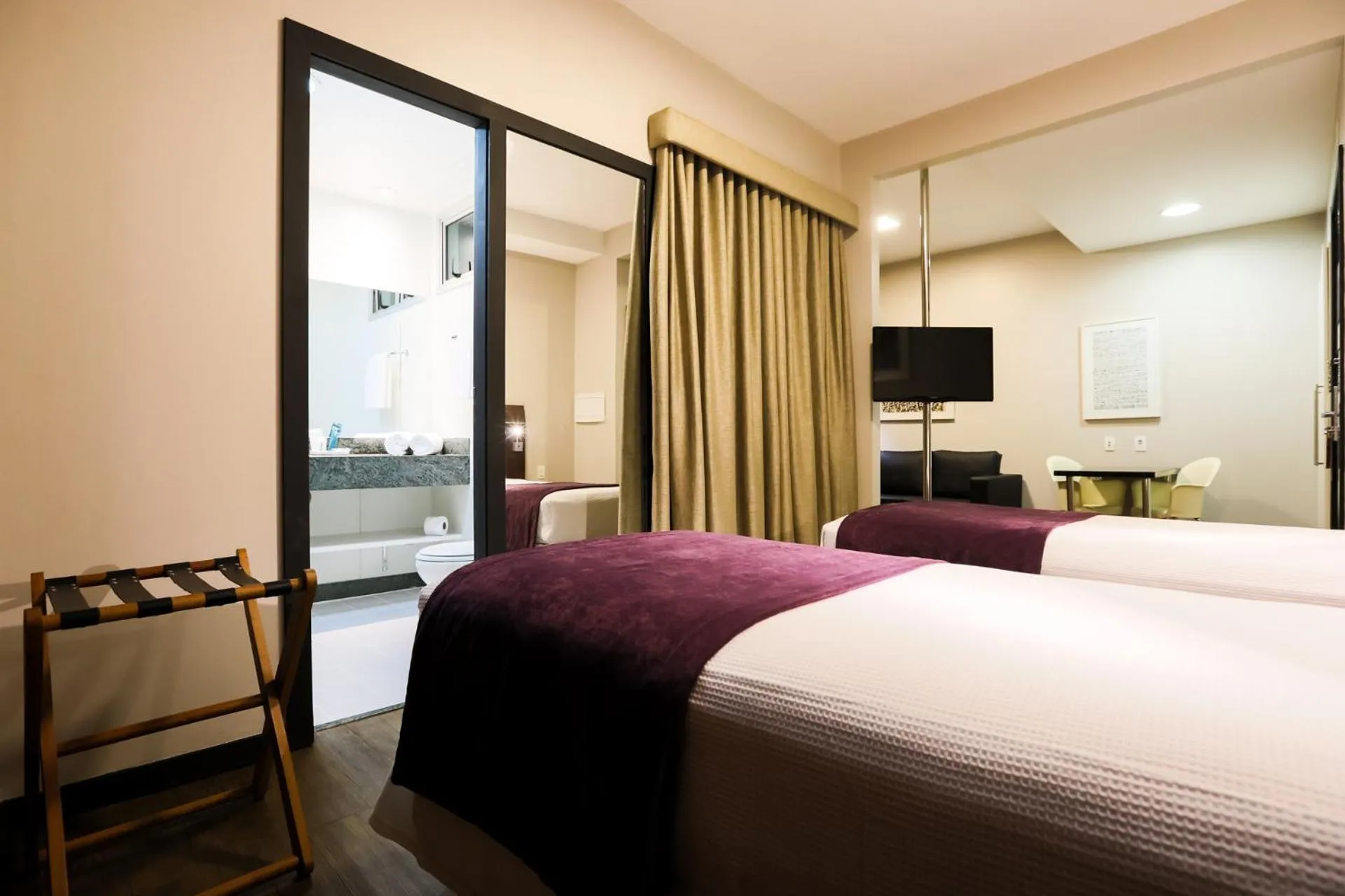 Bed in San Diego Suites Ipatinga