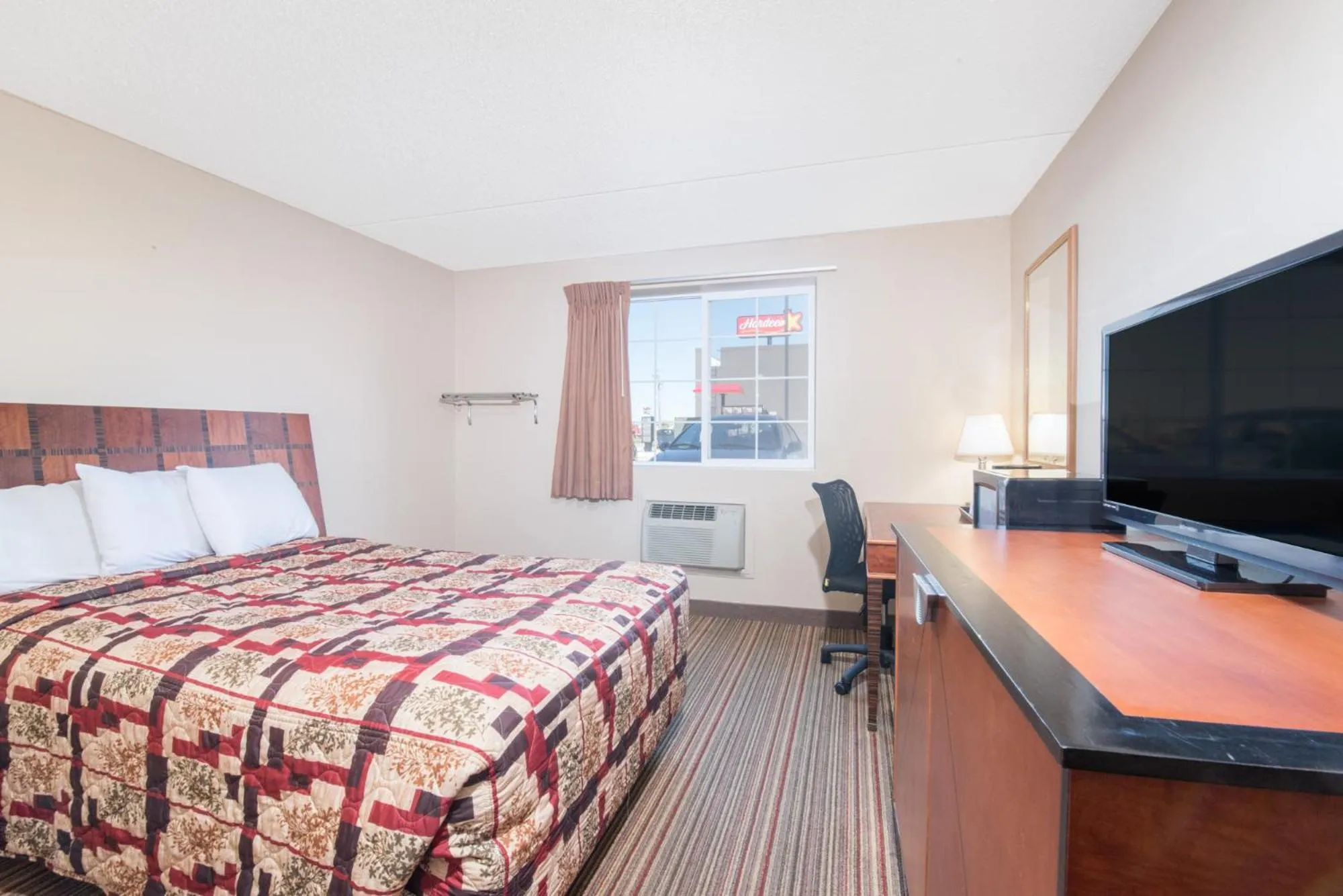 Bed in Knights Inn and Suites - Grand Forks