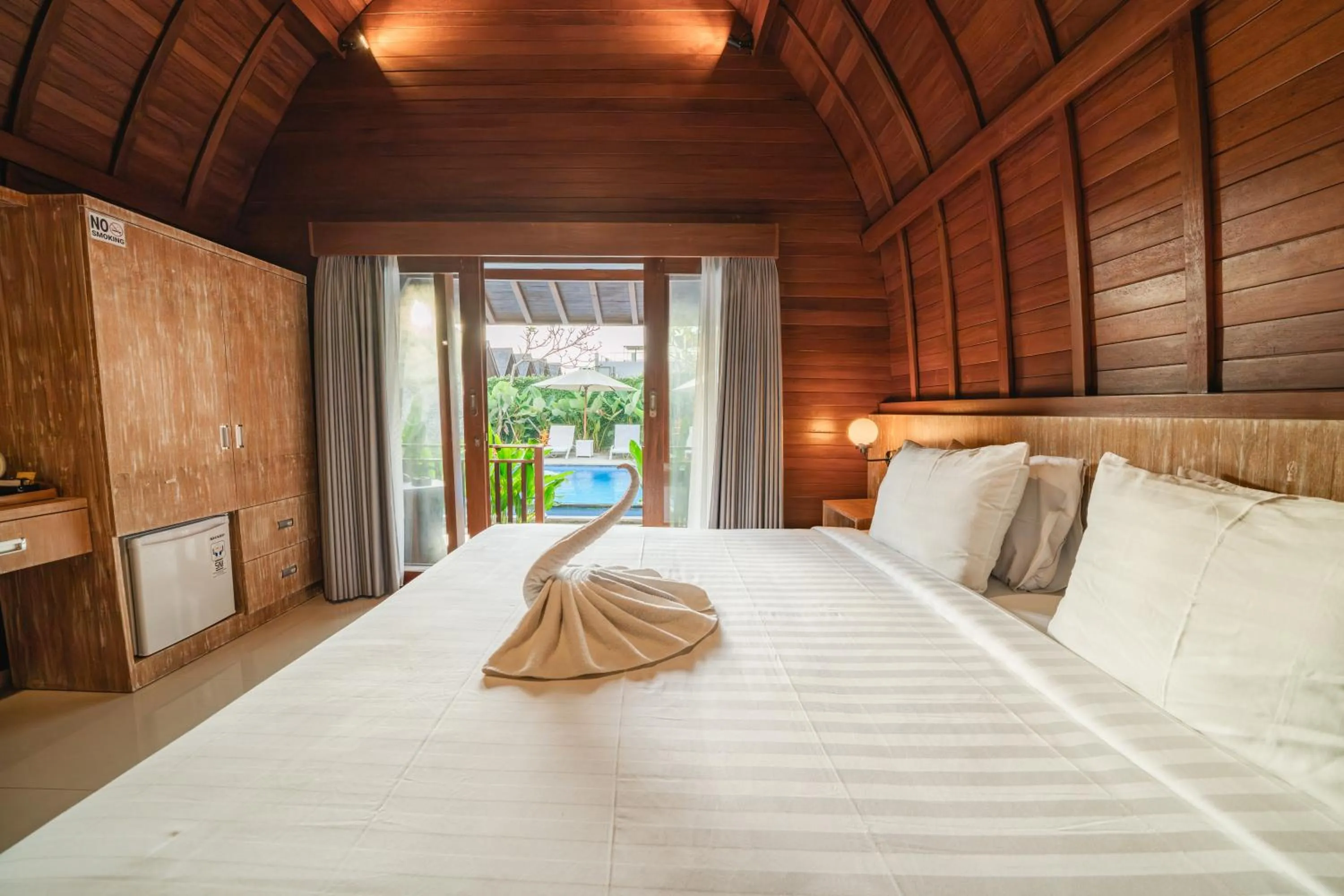 Bed in Uma Mani Villa Jimbaran