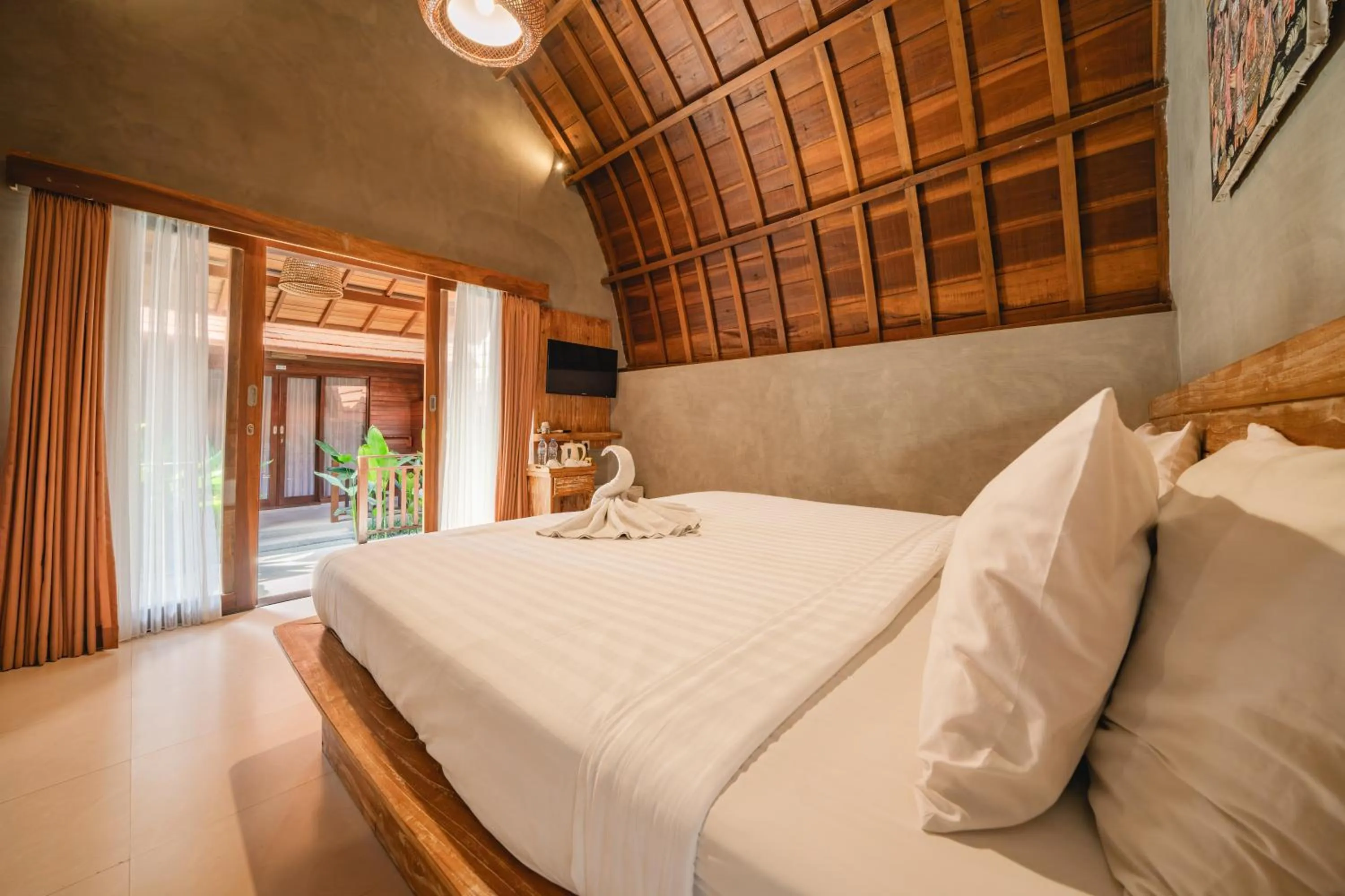 Bed in Uma Mani Villa Jimbaran