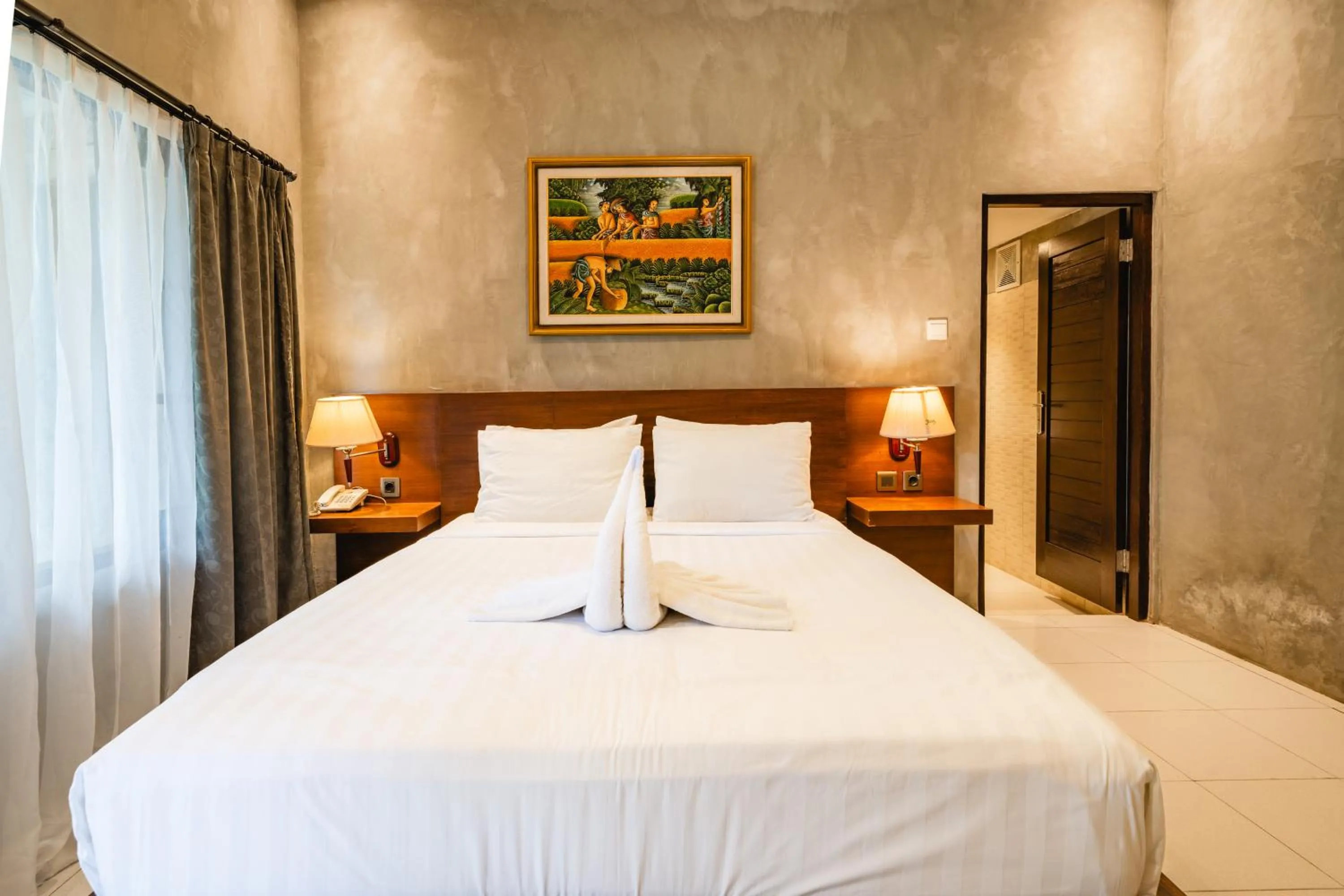 Bed in Uma Mani Villa Jimbaran