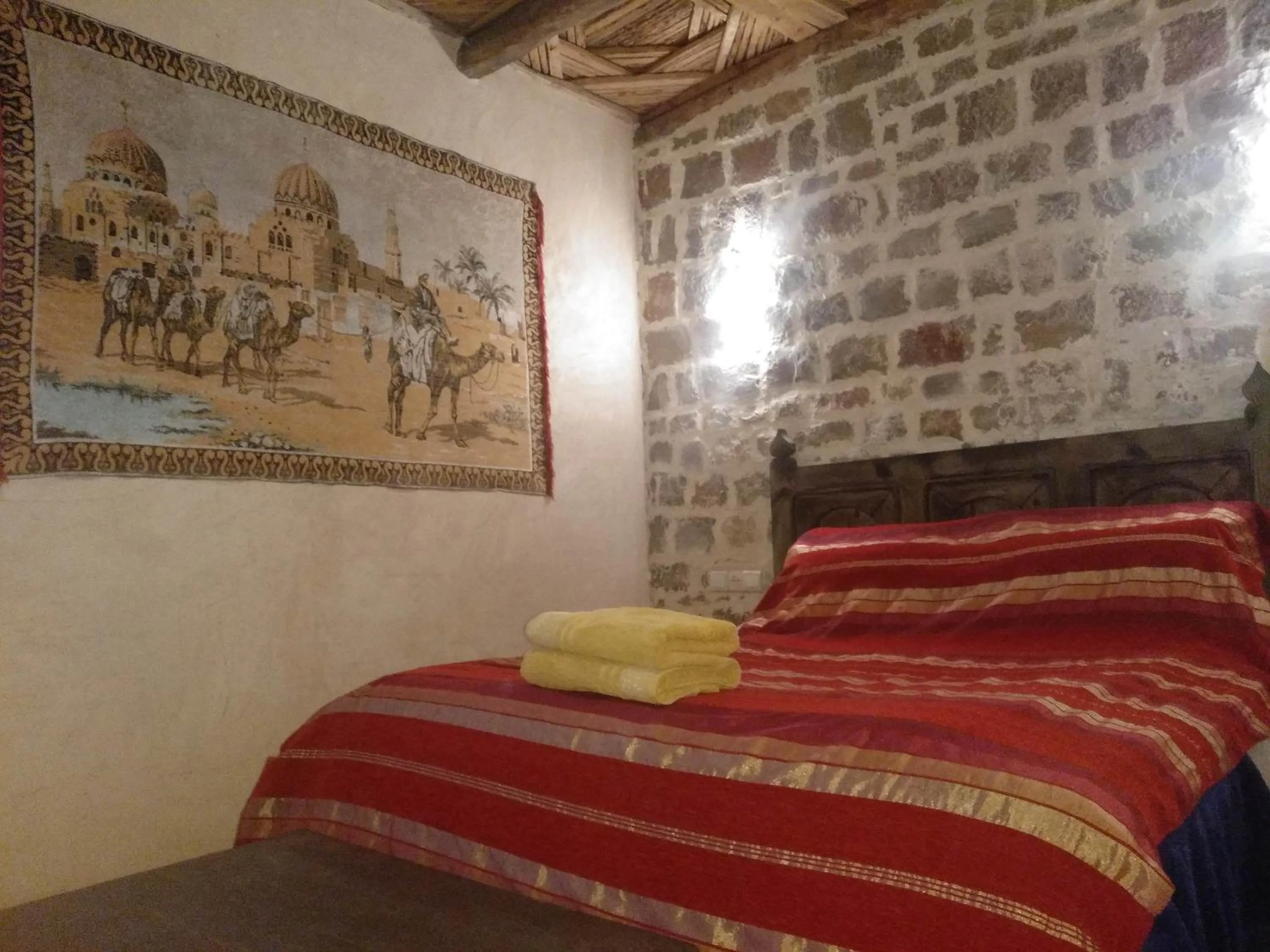 Bed in Chambre d'hôtes aya