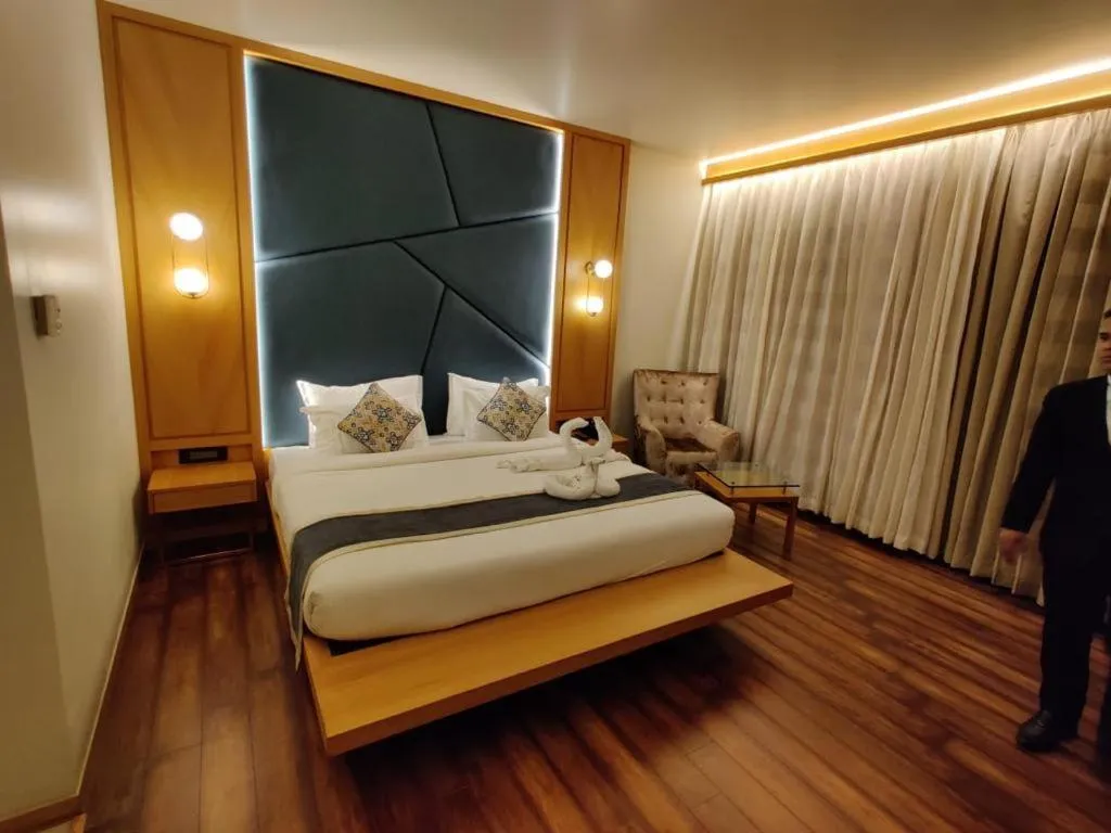 Bed in Krishna Palace Hotel
