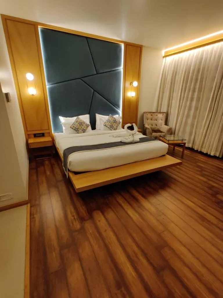 Bed in Krishna Palace Hotel